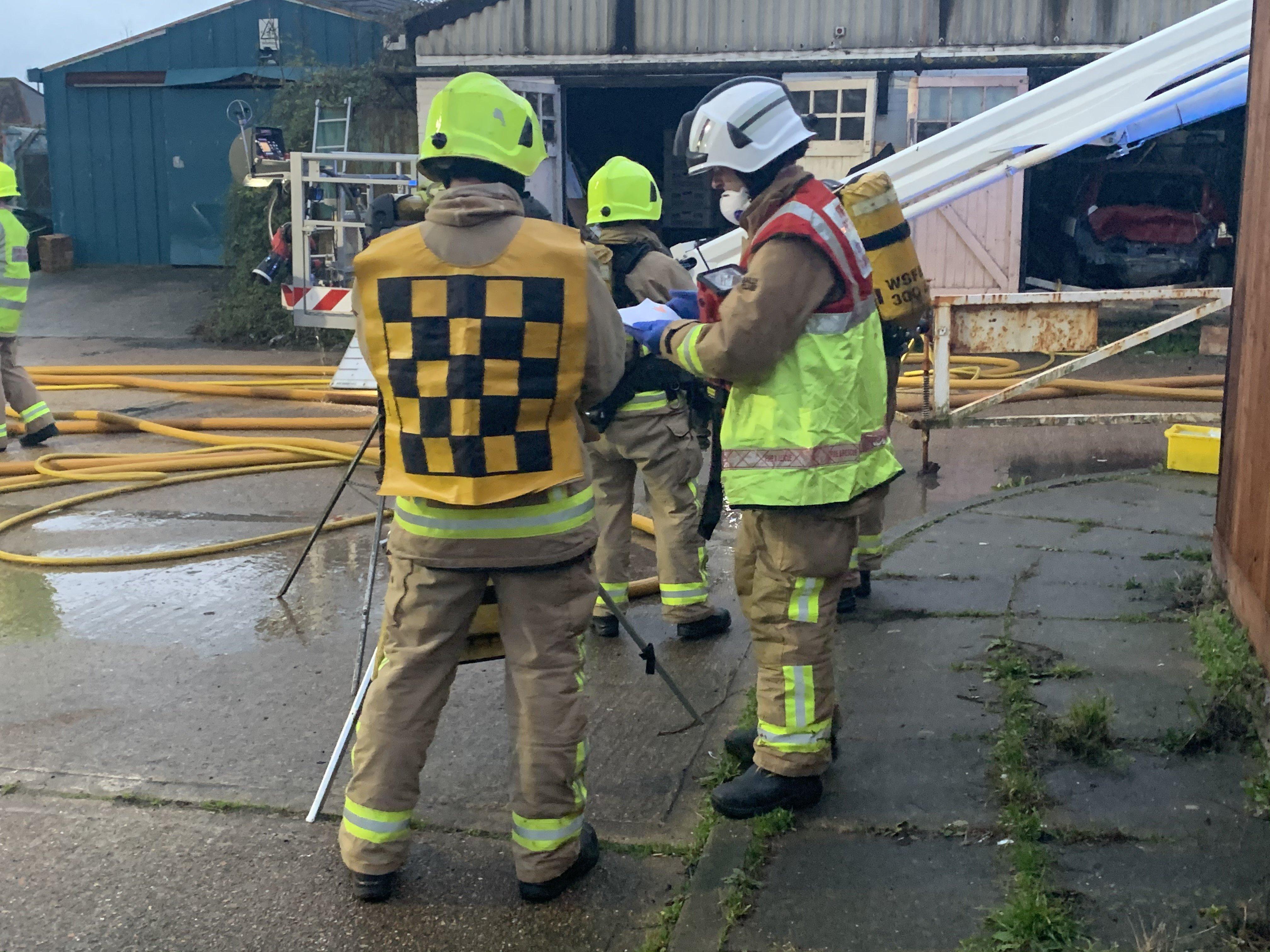 Firefighters at a building fire in Lancing SUS-191124-165022001