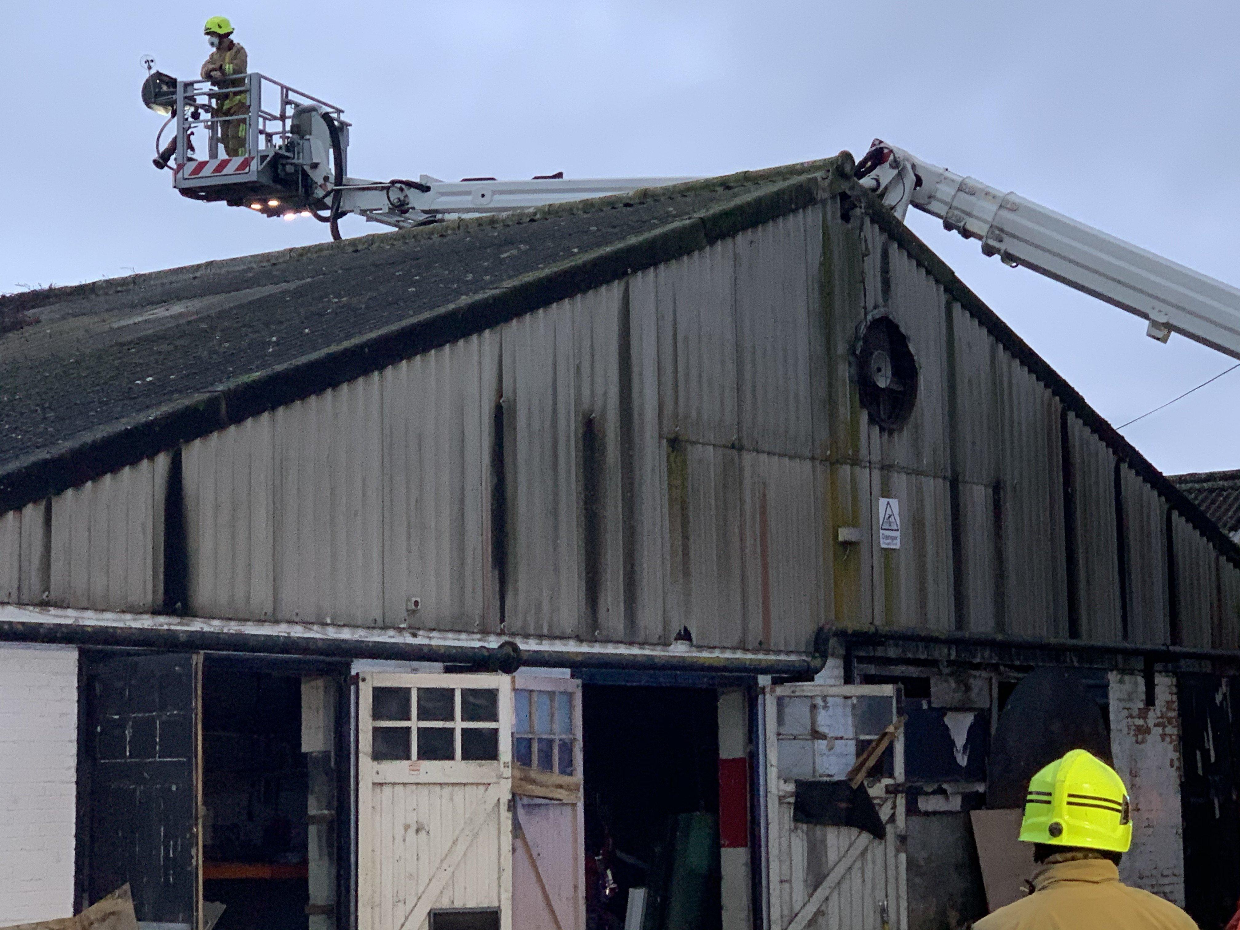 Firefighters at a building fire in Lancing SUS-191124-164949001