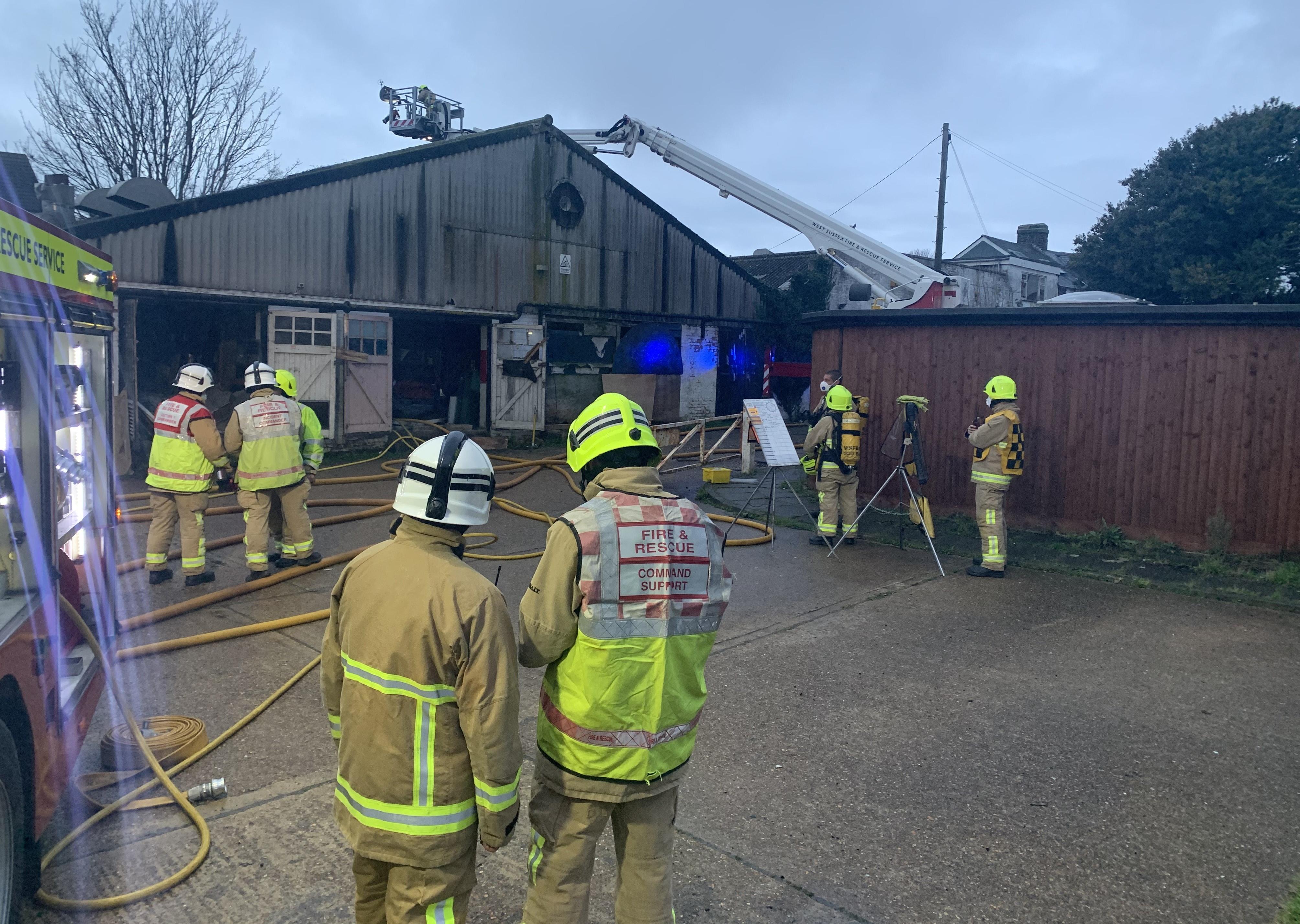 Firefighters at a building fire in Lancing SUS-191124-165000001