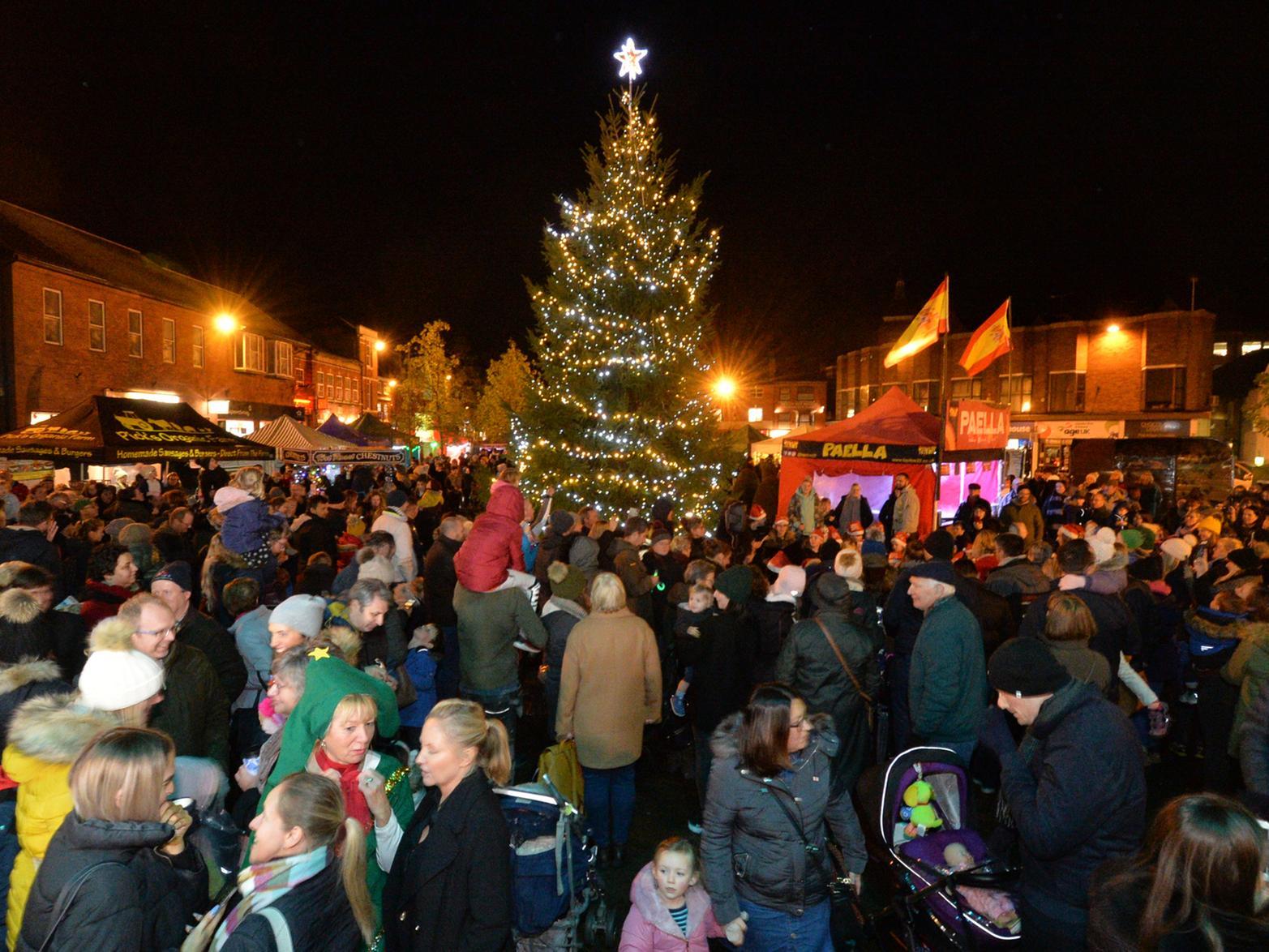 Busy scenes on the Square during the Christmas Tree lights switch on.