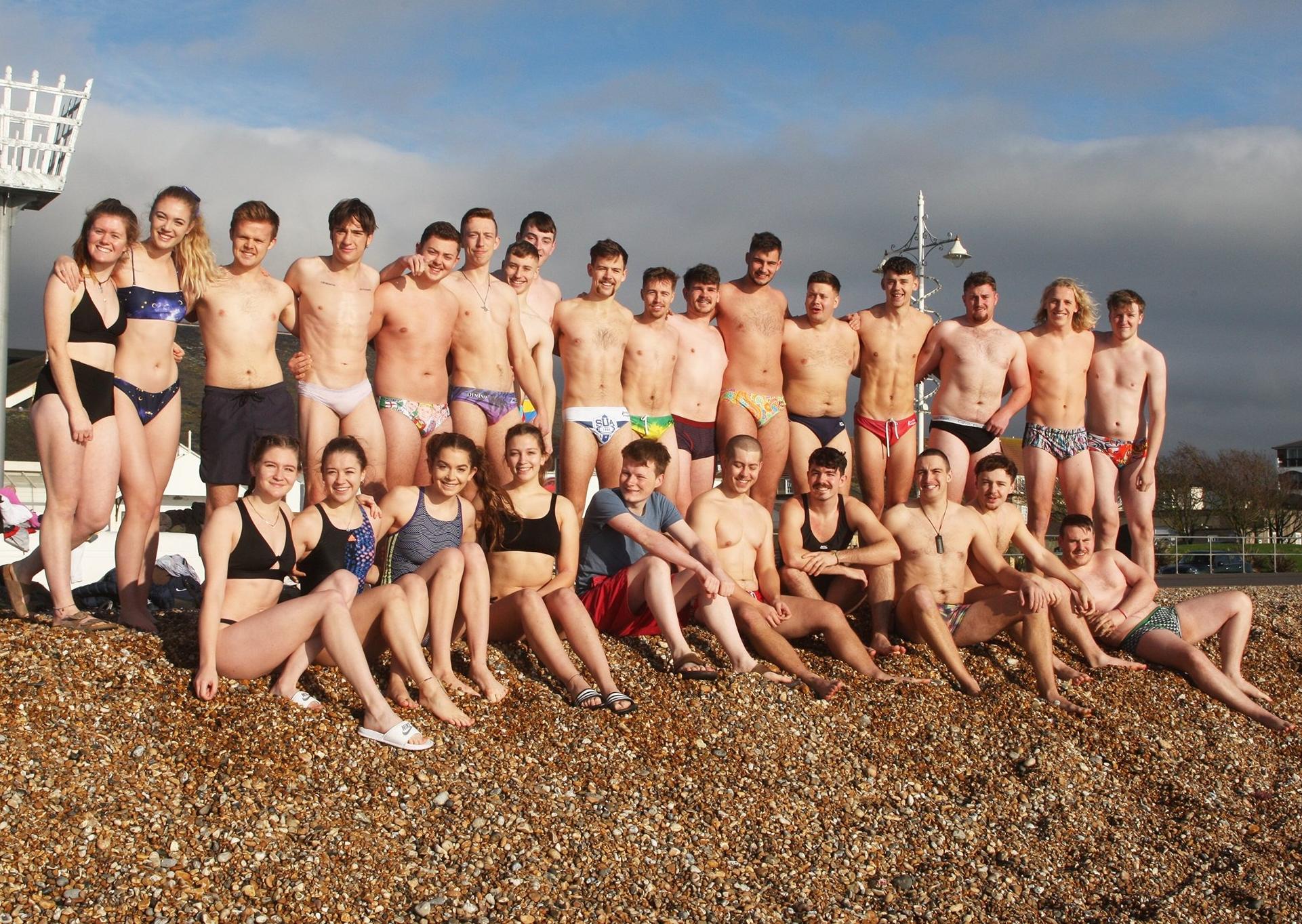 DM19112460a.jpg. Chichester University students take a dip in the sea for Movember. Photo by Derek Martin Photography. SUS-191124-162425008