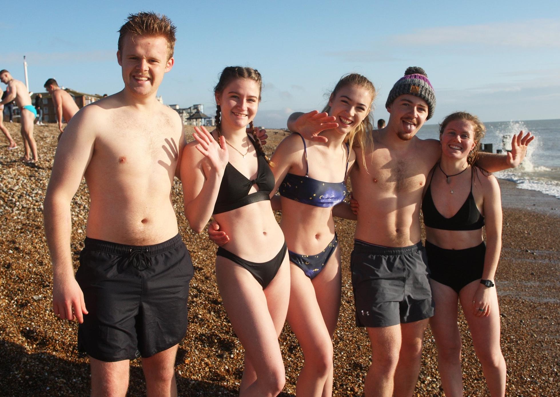 DM19112574a.jpg. Chichester University students take a dip in the sea for Movember. Photo by Derek Martin Photography. SUS-191124-162606008