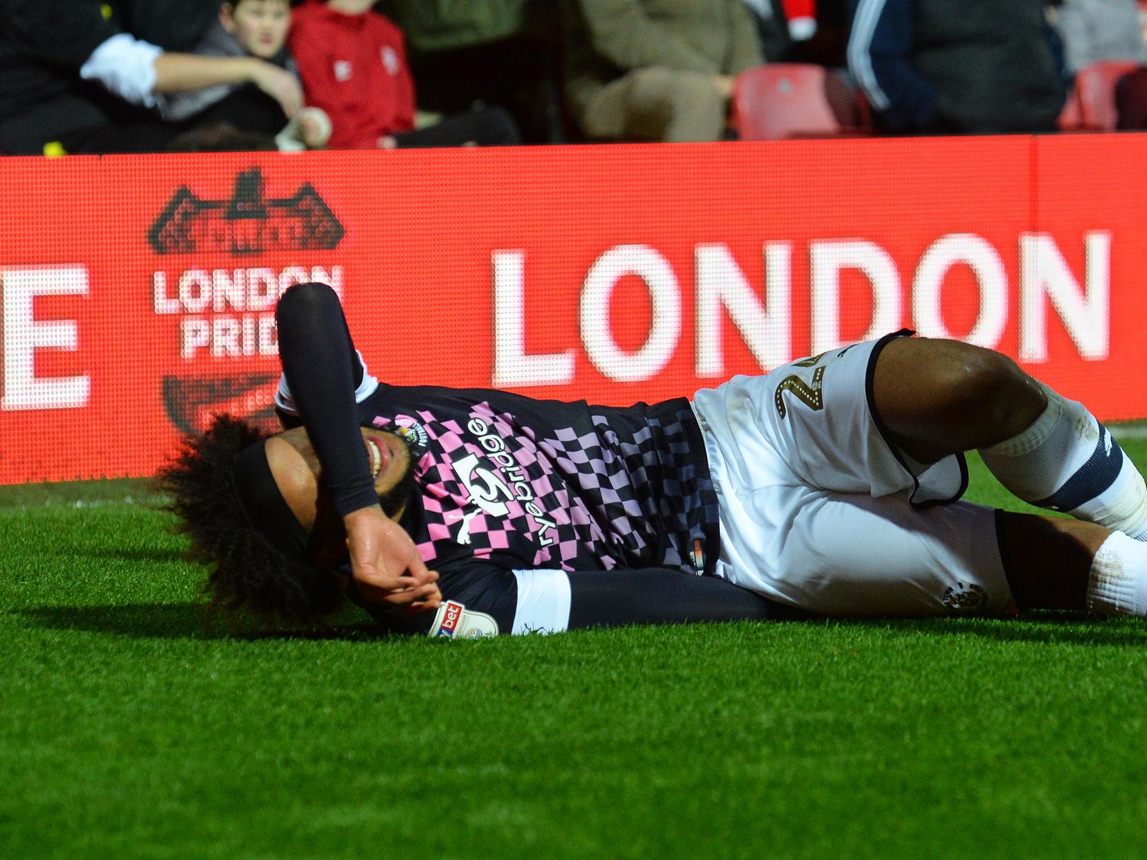 Izzy Brown suffers a hamstring injury during Luton's 7-0 thrashing at Brentford on Saturday