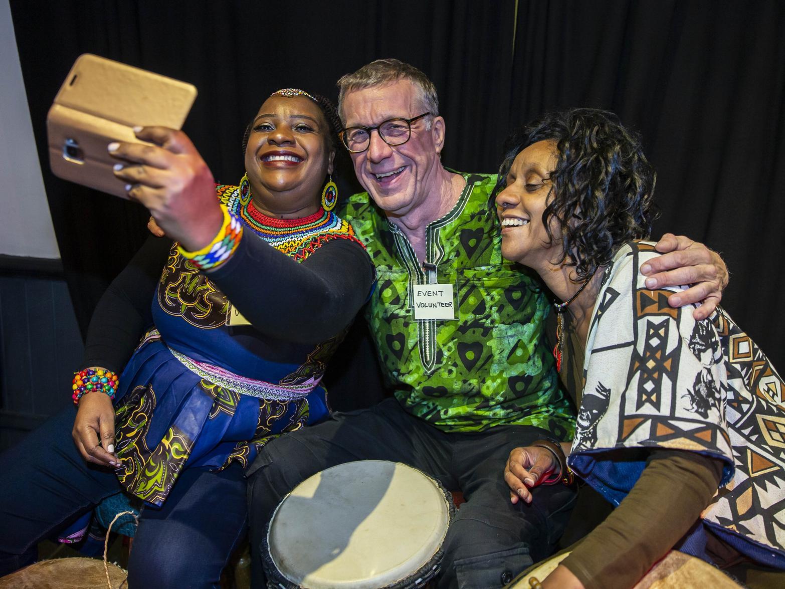 (L-R) Mavis Mundirwa, Richard Dobson and Anne Wankiiri take a selfie at the African and Caribbean Festival