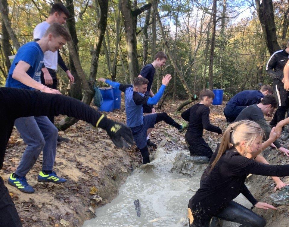 More than 100 year-11 students and 18 staff from Durrington High School tackled the challenging assault course at Henfold Lakes in Dorking