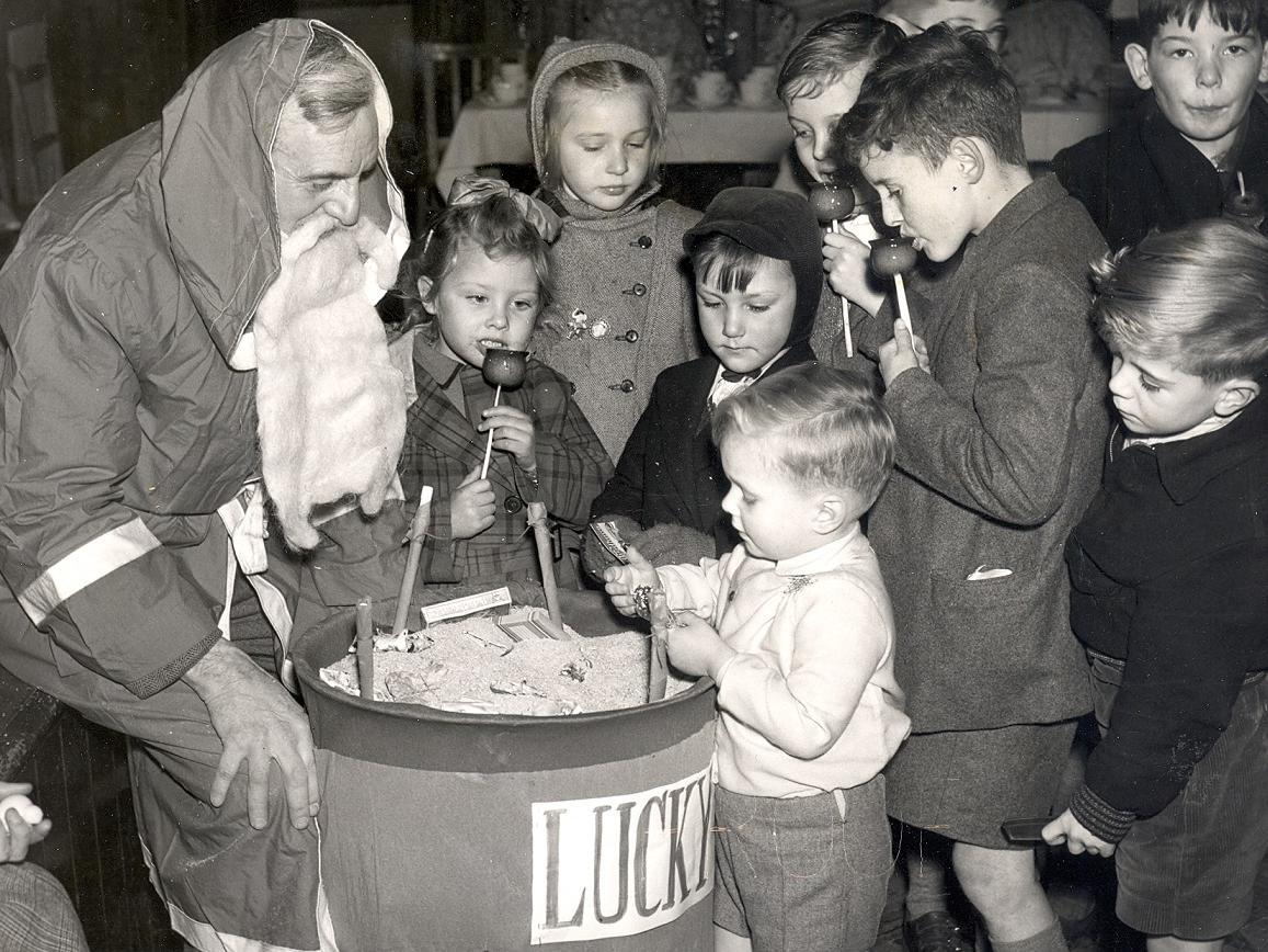 Father Christmas with 'lucky dip'