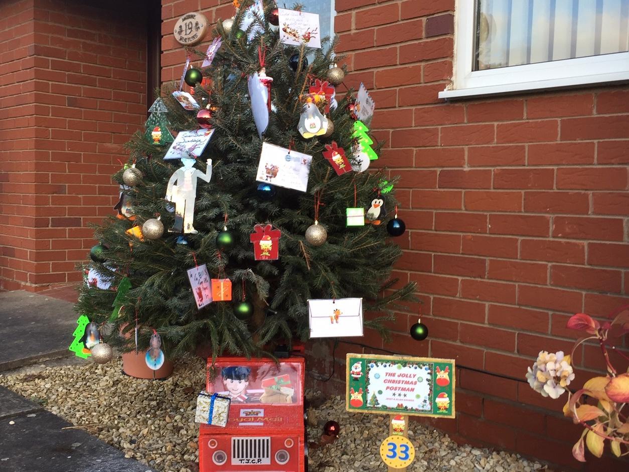 The Jolly Christmas Postman tree