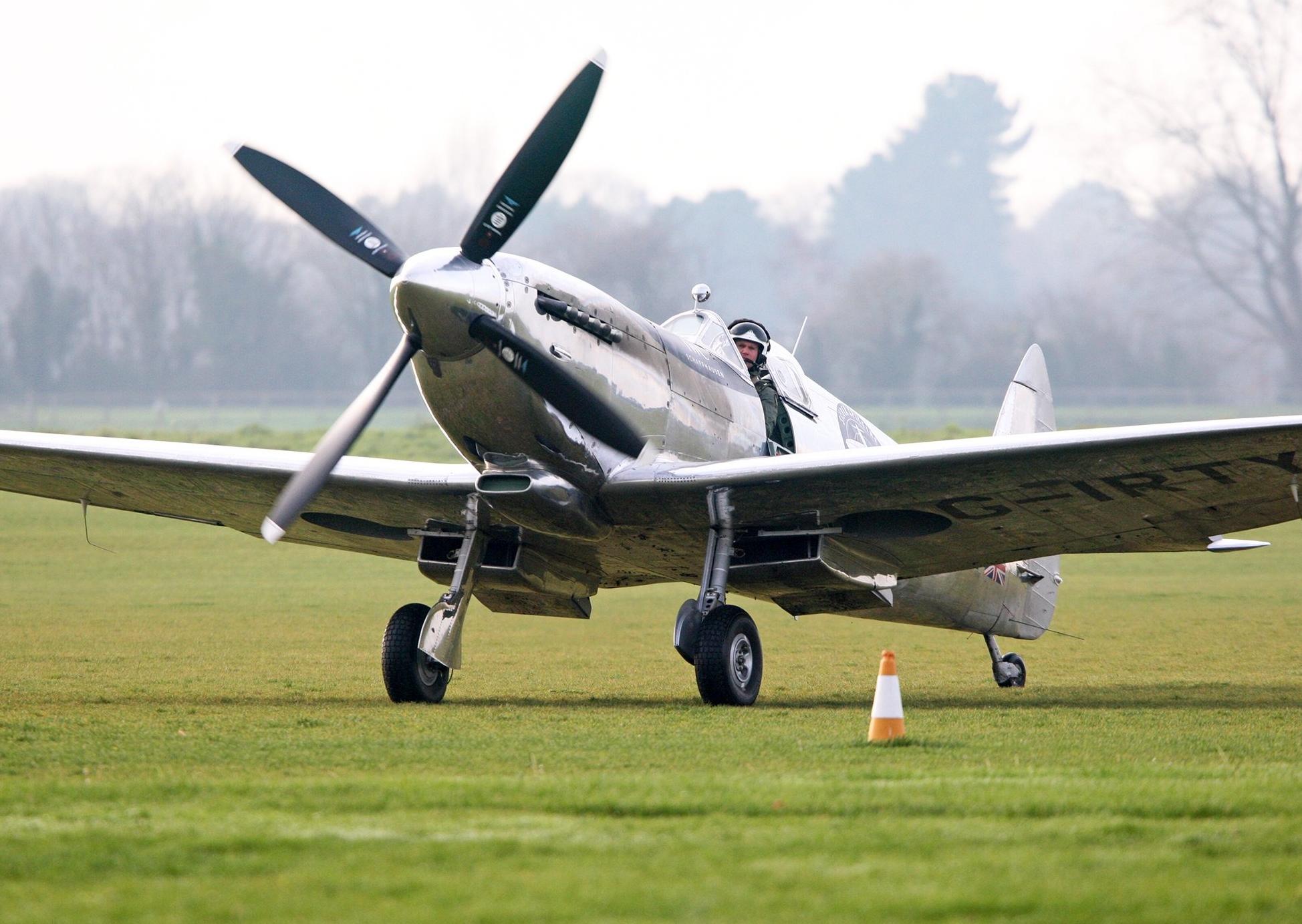 DM19121043a.jpg. A newly-restored spitfire aircraft lands at Goodwood following a 27,000 mile journey around the world. Photo by Derek Martin Photography. SUS-190512-171006008