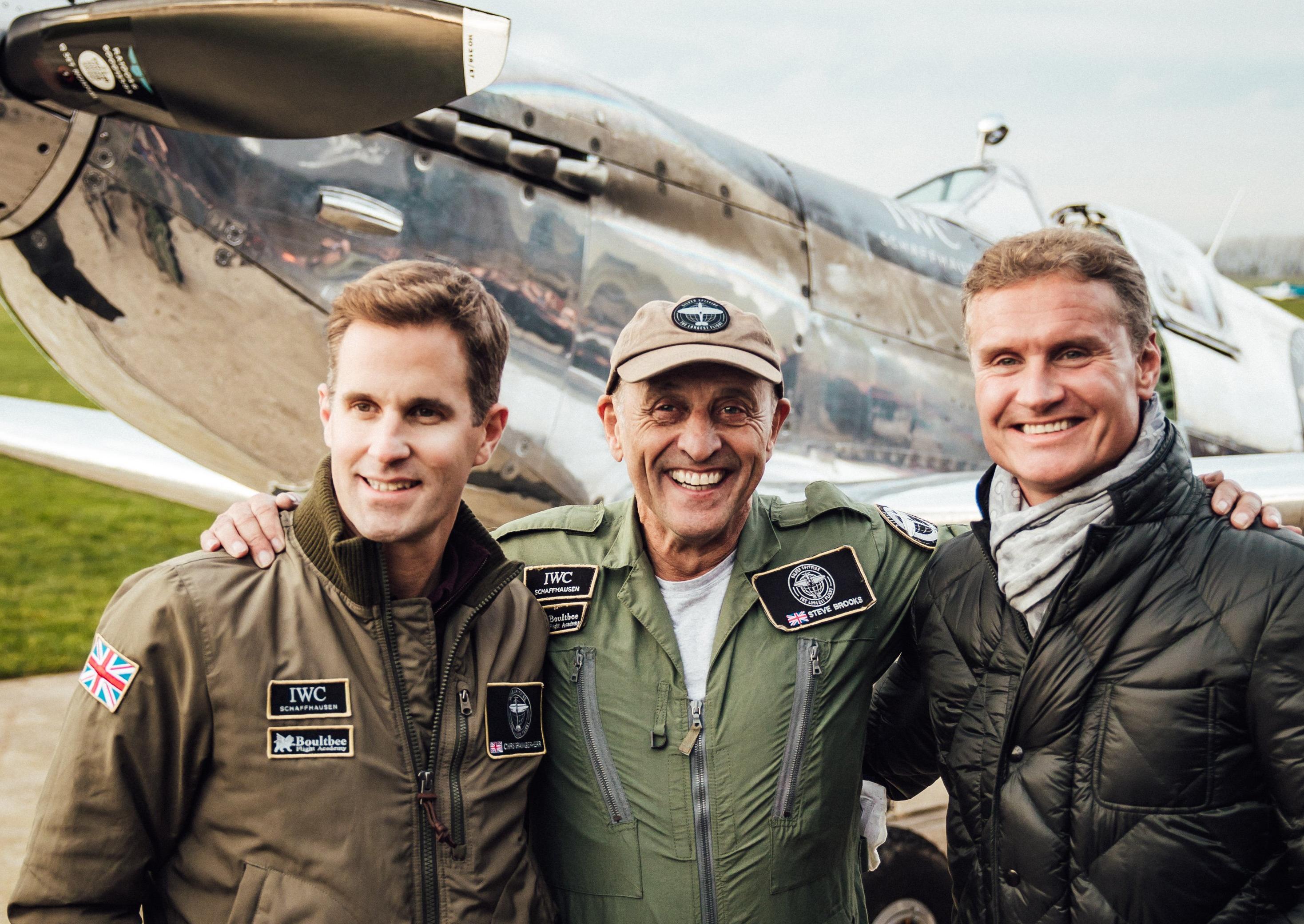 Formula 1 driver and IWC brand ambassador David Coulthard greeted the two Goodwood pilots after they landed back home after flying a Silver Spitfire around the world in four months. Photo by Christopher Busch for IWC Schaffhausen SUS-190512-175601001