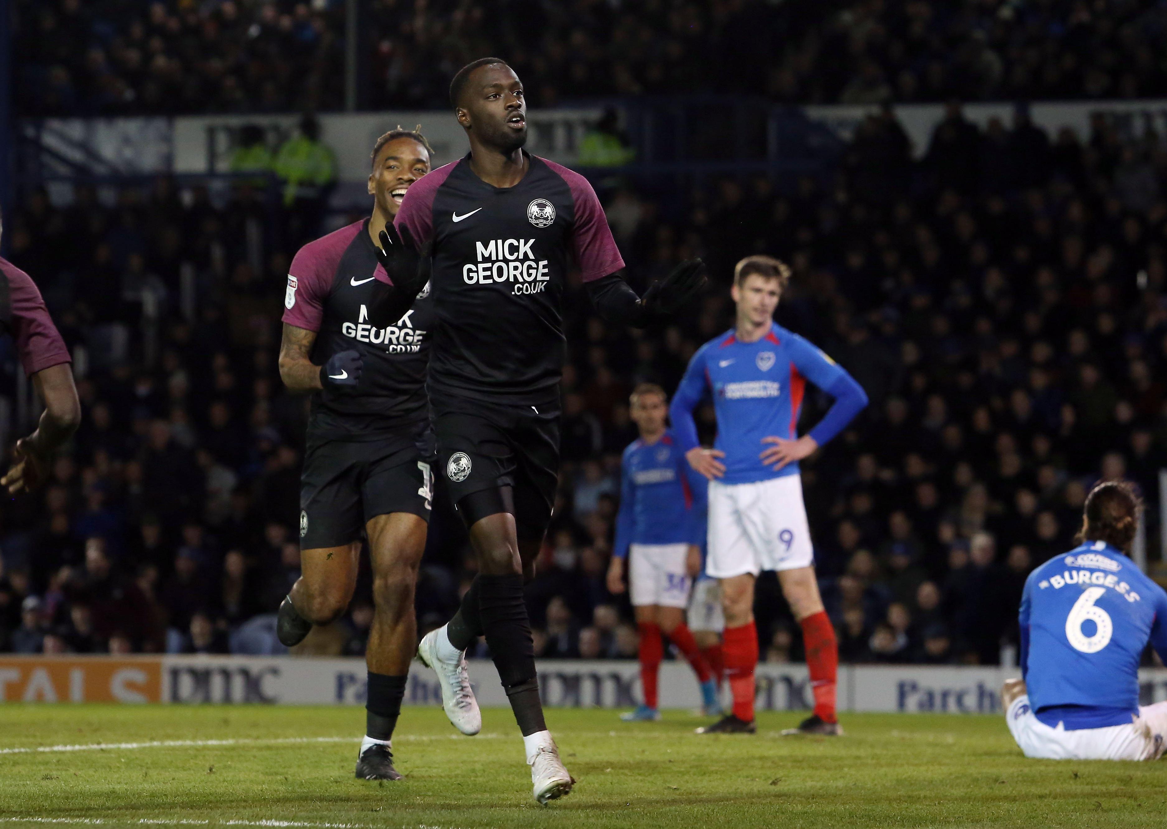 Mohamed Eisa of Peterborough United celebrates scoring his goal at Portsmouth. Photo: Joe Dent/theposh.com.