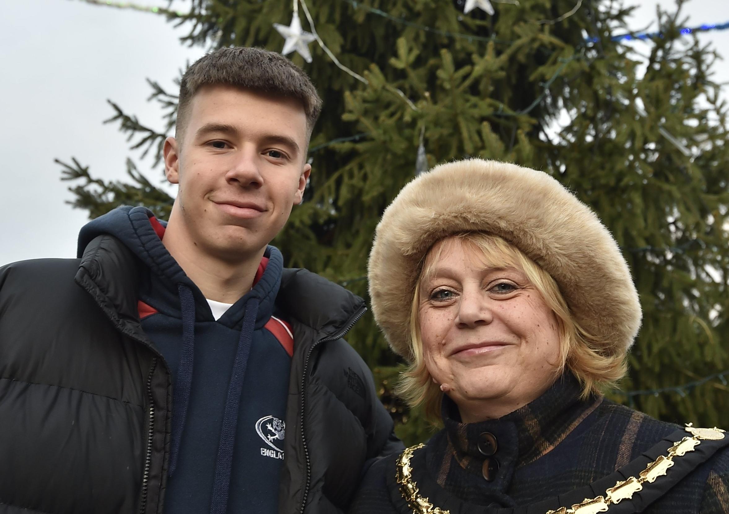The Whittlesey Young Citizen of the Year, who switched on the lights, with Mayor Julie Windle. EMN-190812-094055009