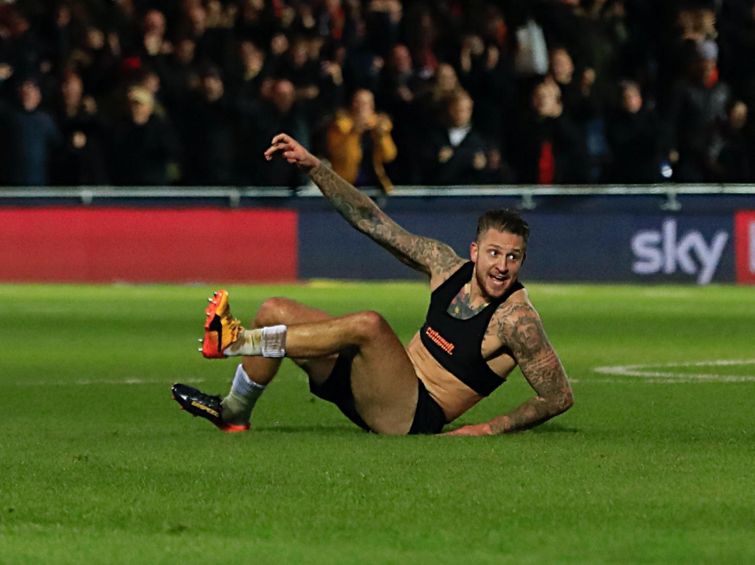 The hero of the hour, as he kept his nerve superbly to slot home the the stoppage time winner and begin scenes of celebration at Kenilworth Road that will be remembered for a long, long time.