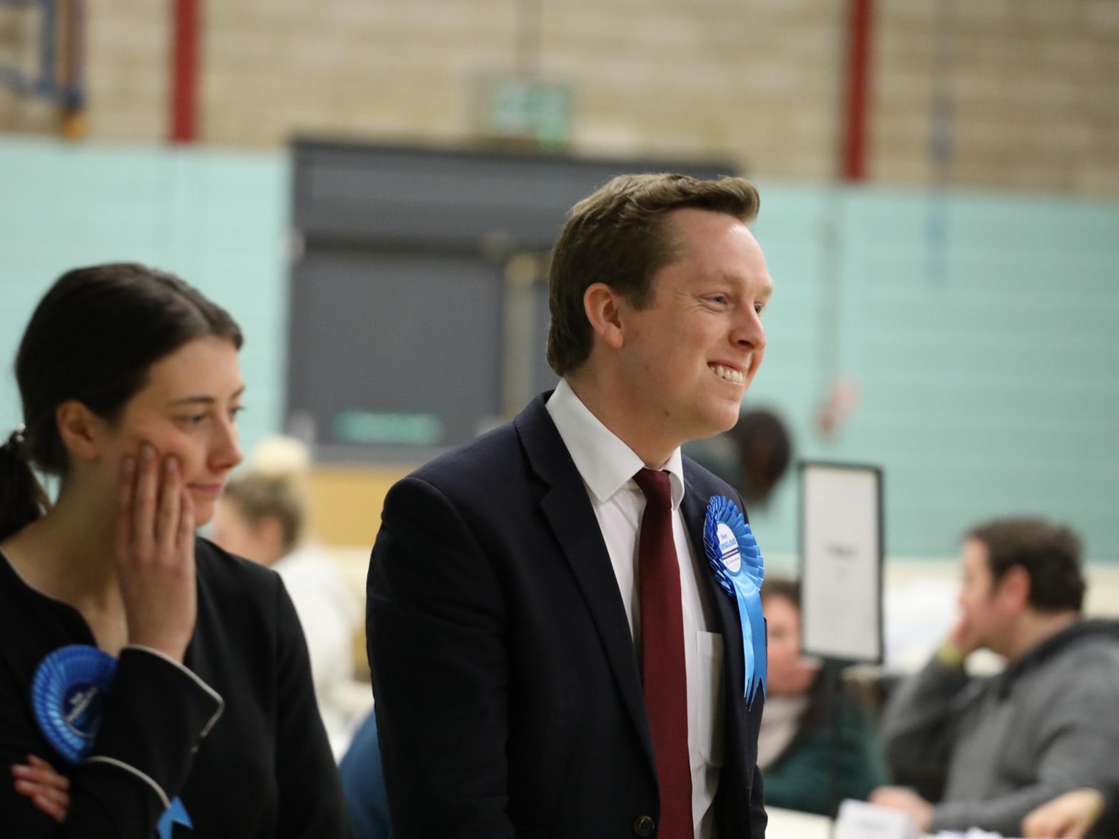 Tom Pursglove arrives at the count with East Northants MP Harriet Pentland