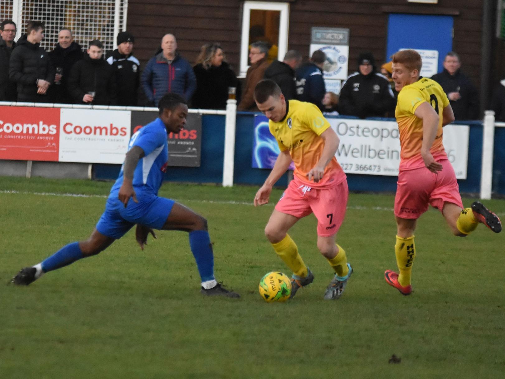 Keiran Rowe steps away from a defender.
