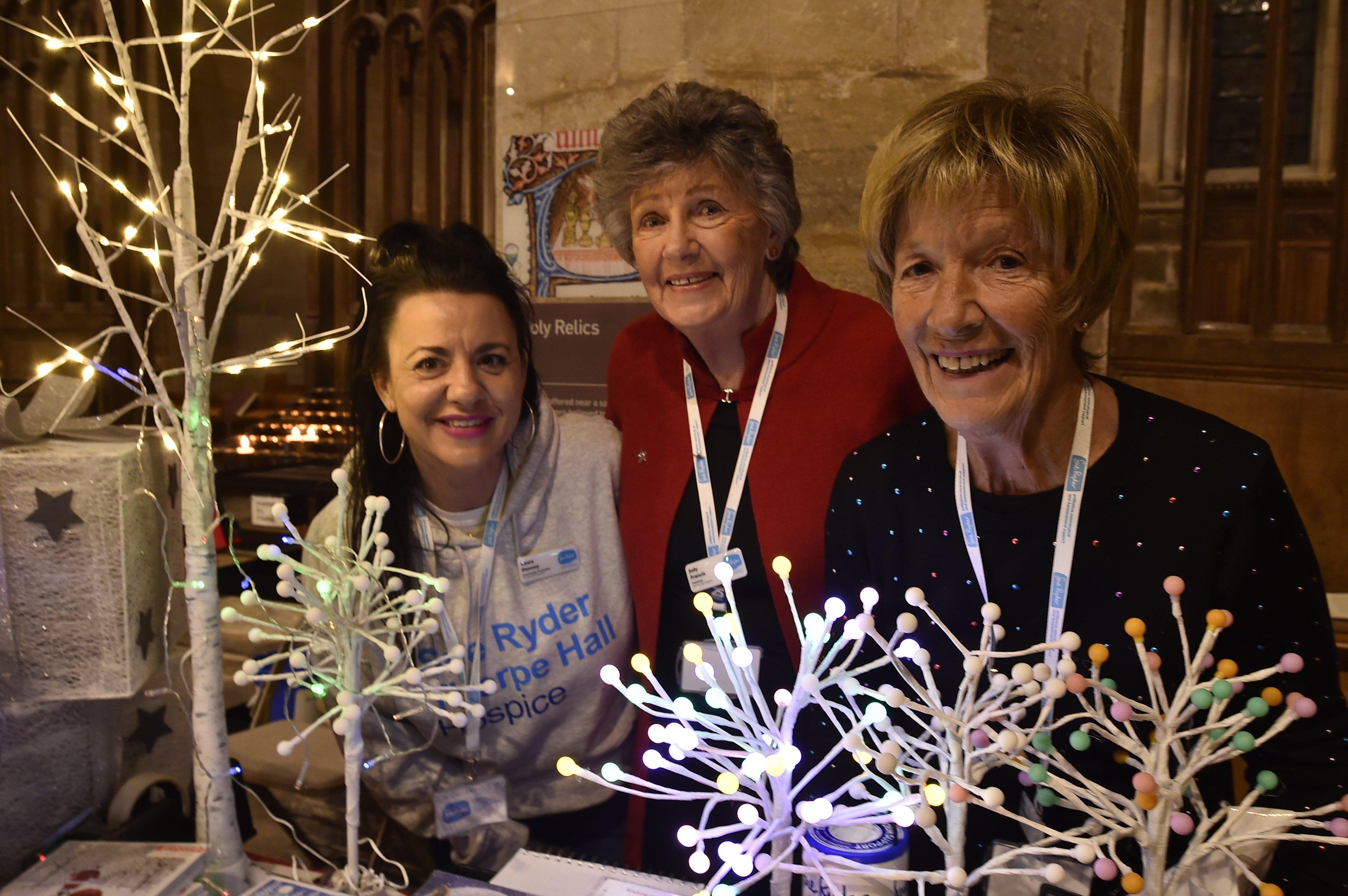 Sue Ryder Lights of Love service at Peterborough Cathedral.   Laura Denney, Judy Francis and Sue Travers at their stall. EMN-191215-215827009