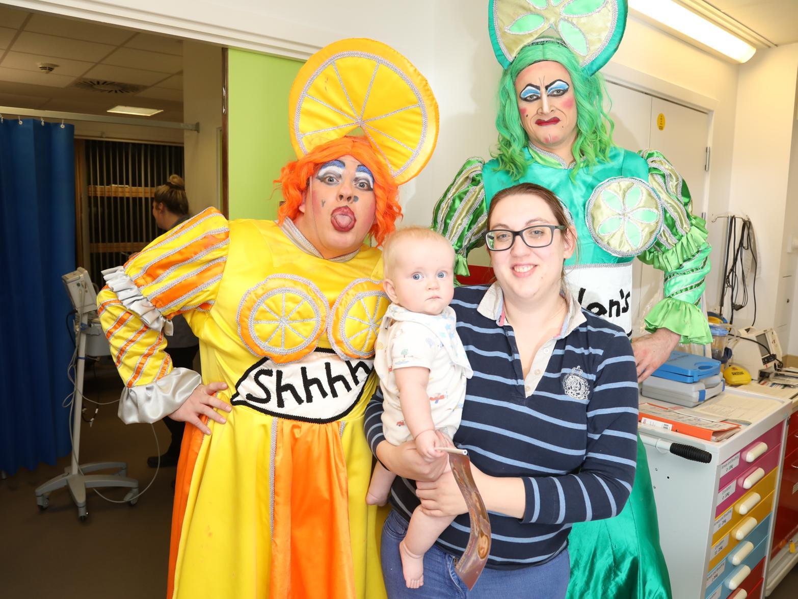 Baby Sam Parker, nine months, with his mum Hannah Gilbert, didn't know what to make of the ugly stepsisters at first!