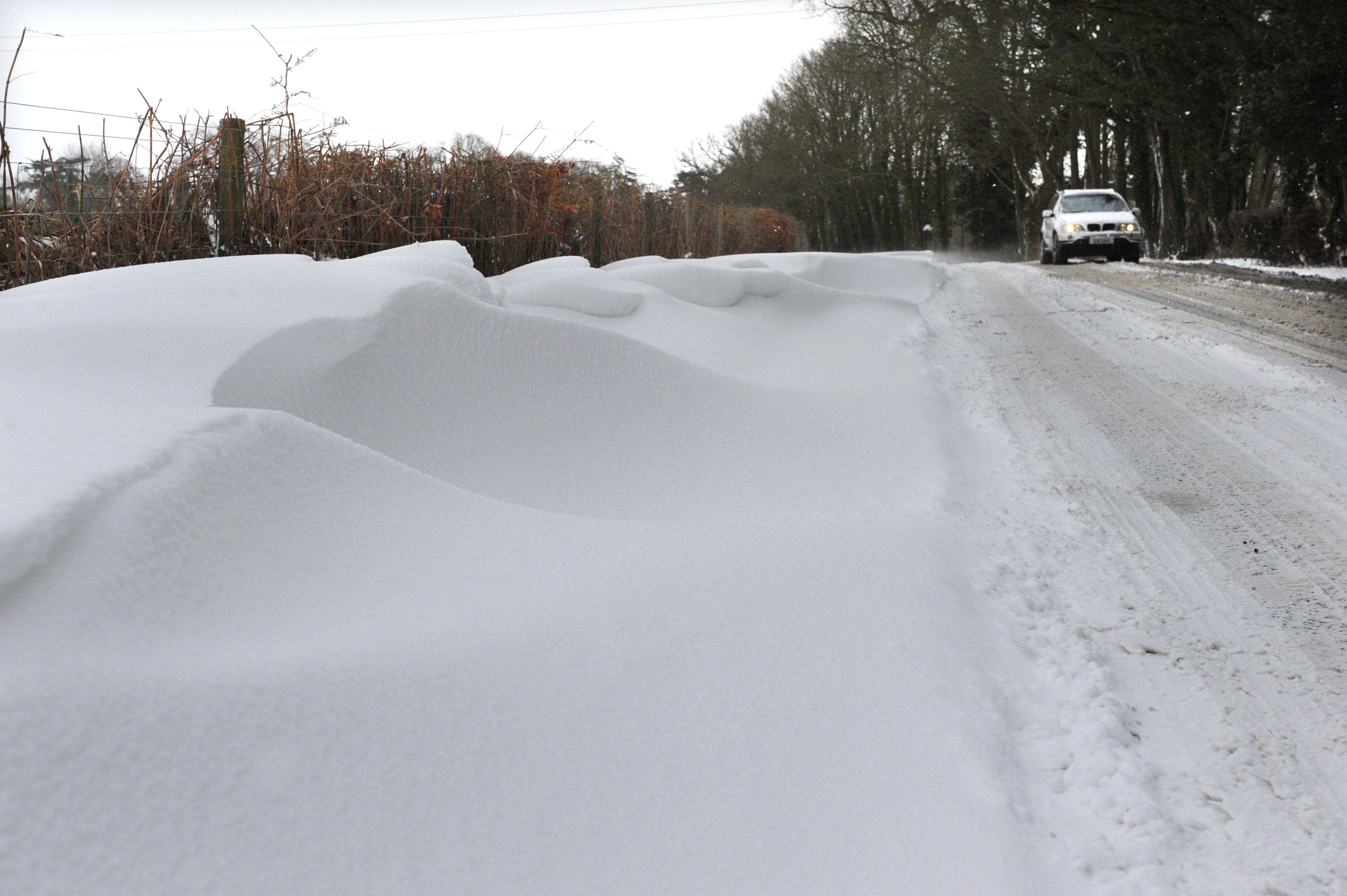 Big snow drifts built up near Monks Gate in March 2013
