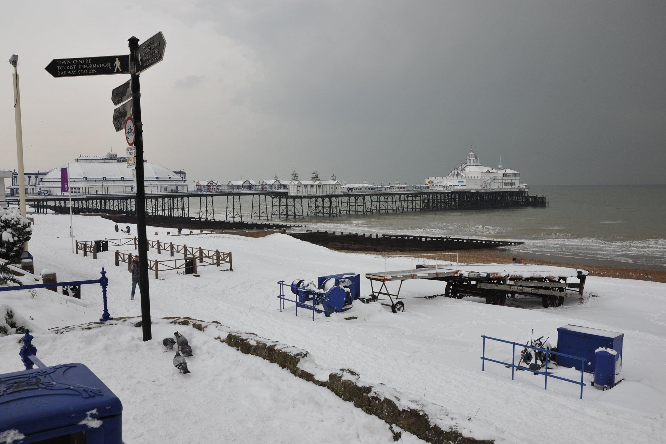 Eastbourne pier and seafront in the snow in December 2010
