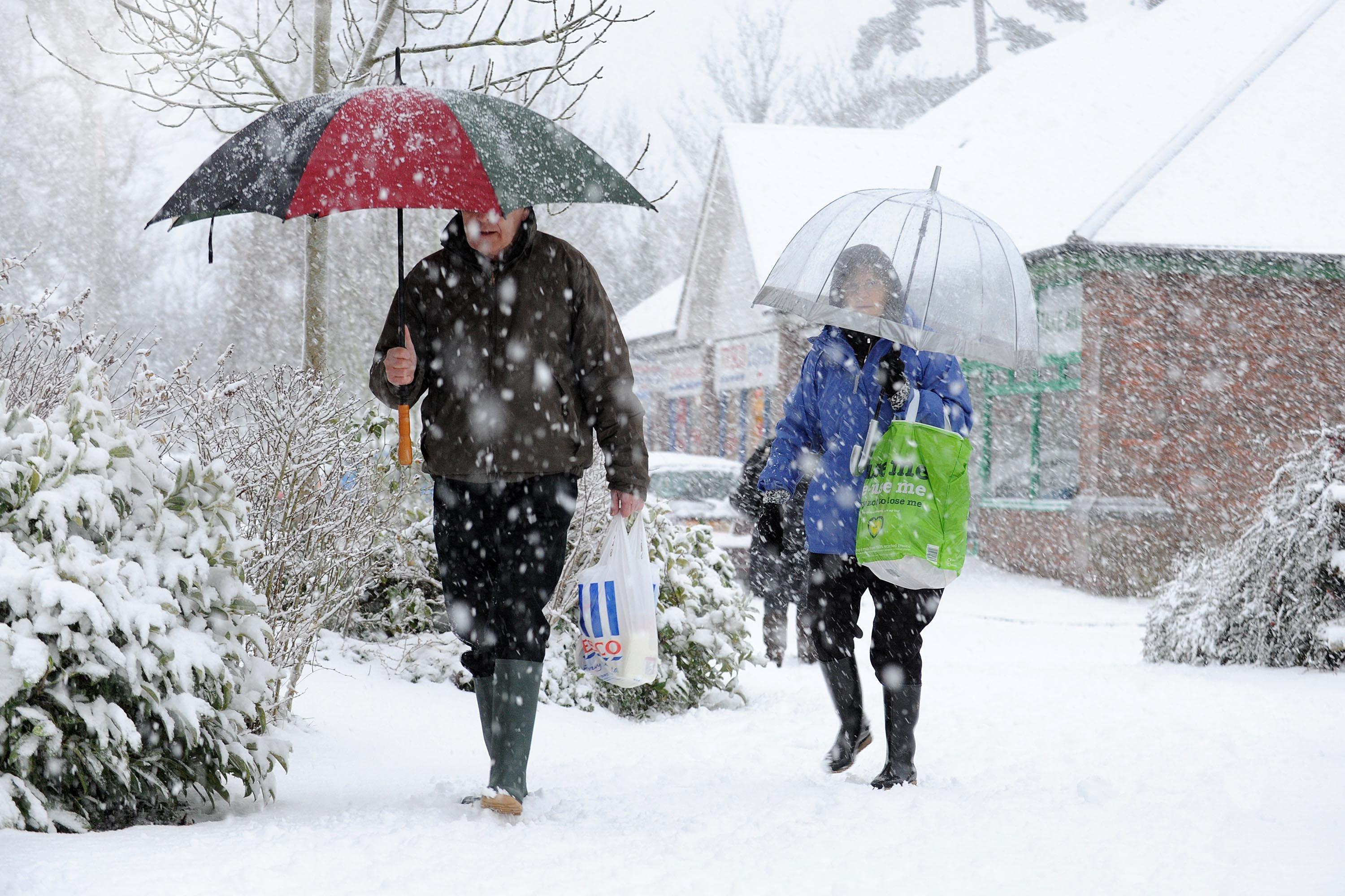 Braving the blizzard near Tesco Express in Burgess Hill in December 2010