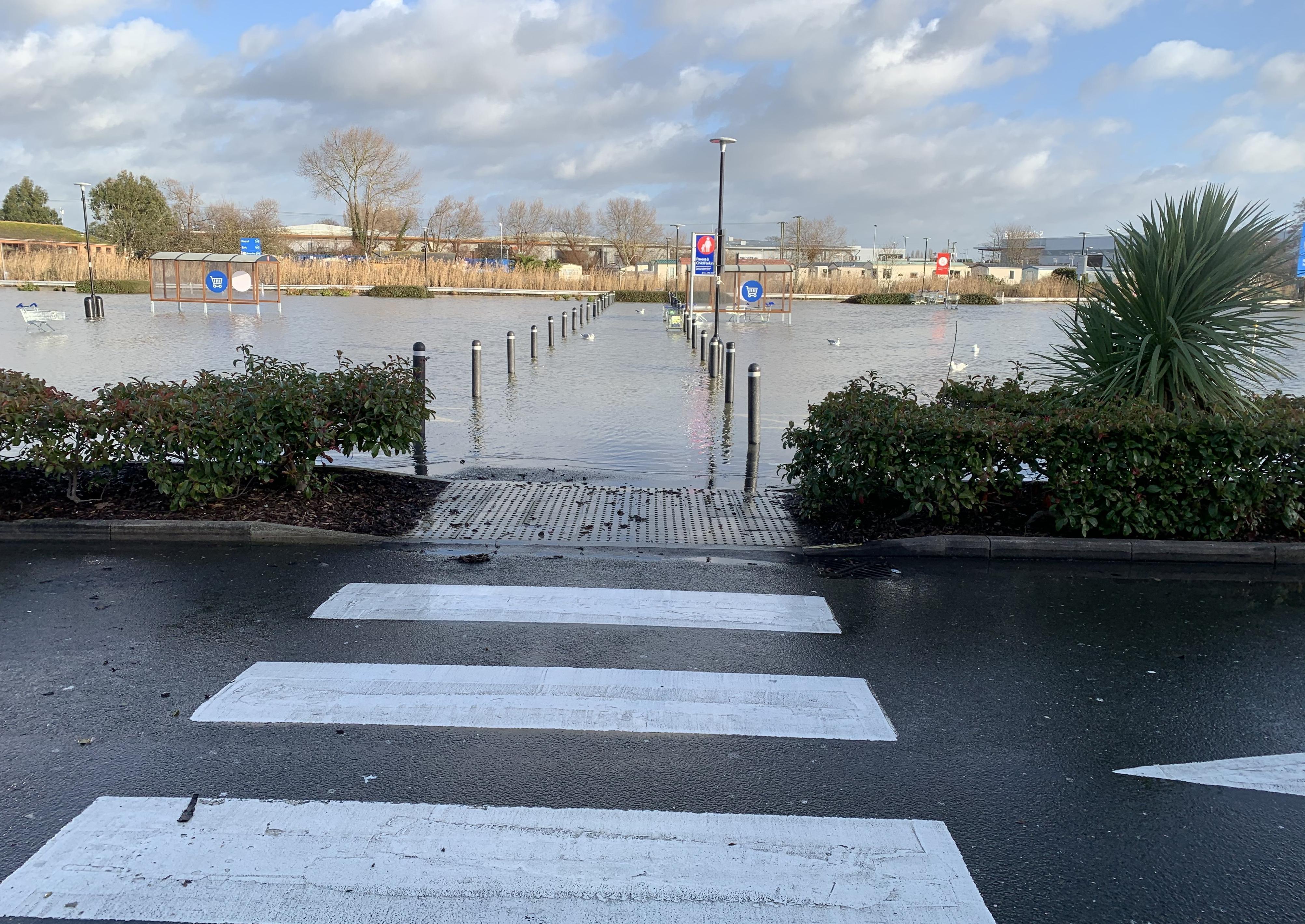 Tesco’s car park in Bognor Regis has been left under water after more flooding over the weekend. SUS-191223-143550001