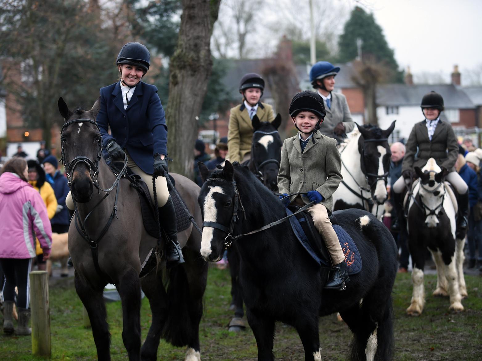 Riders meet on the Green during the Boxing Day Hunt meet.