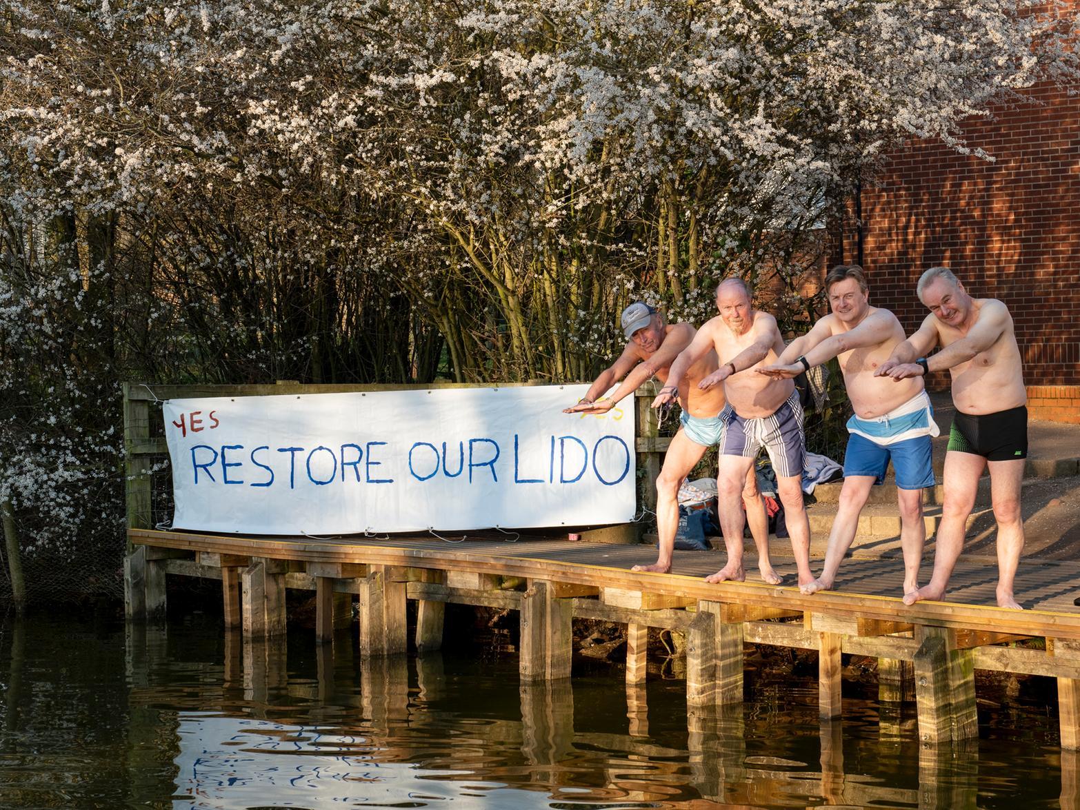It is not often you see four men ready for a February swim in the Abbey Fields lake.
But there was a good reason for it - these campaigners fighting against plans to close the outdoor pool were responding to a comment made by a councillor who said: "If you want outdoor swimming, then go and swim in the lake."
None of the men pictured actually jumped in - but one person who did take a dip was Lindsey Cole, who was the first person to swim
the length of the River Thames. She arrived in town a bit later to help with the campaign.