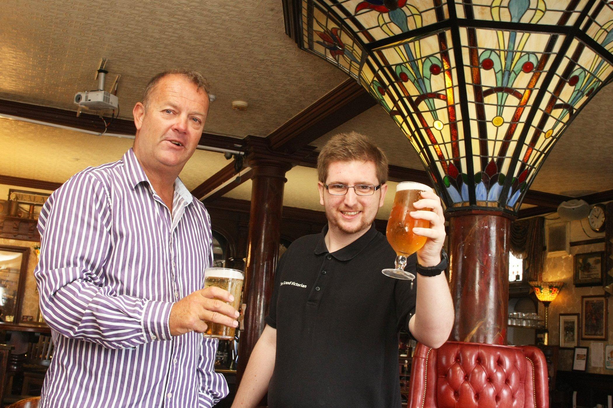 New manager Gary May with barman Josh Riley at the Grand Victorian Hotel in Worthing. Picture: Derek Martin DM1990017a