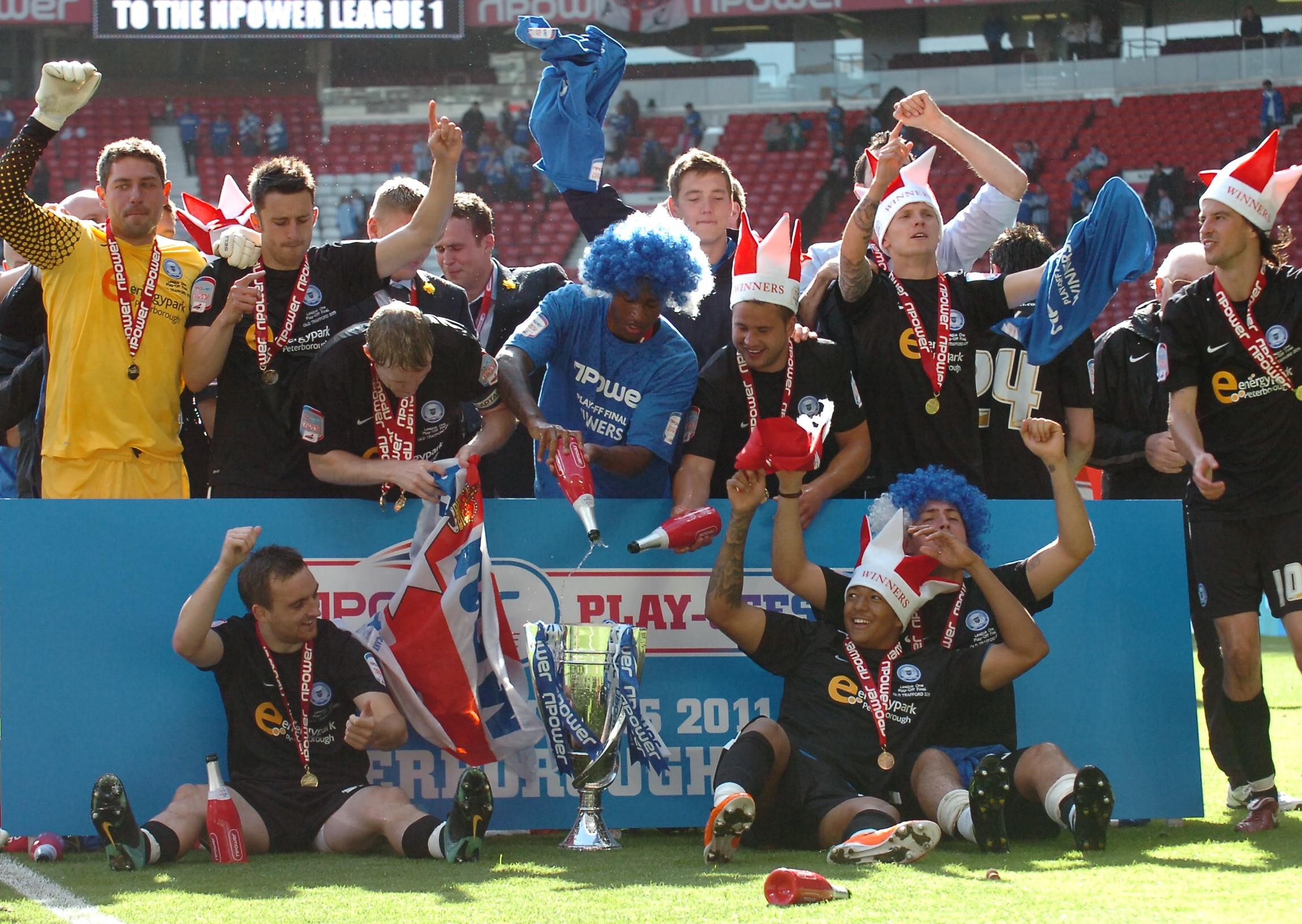 Celebrations for Posh after winning the 2011 League One play-off final at Old Trafford.