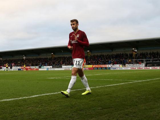 Andy Williams accepts the Cobblers fans' applause after being substituted