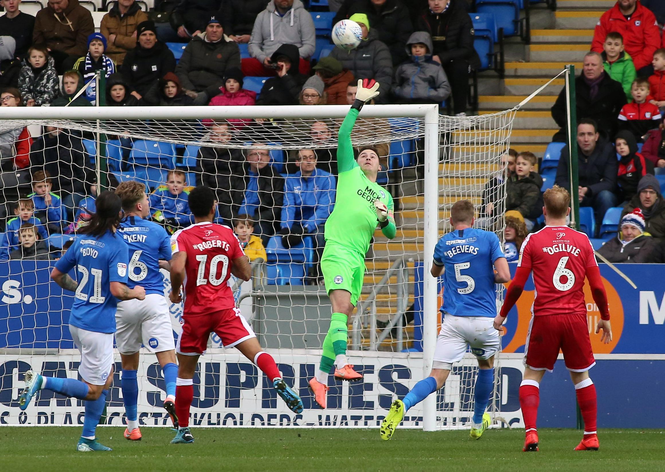 A string of fine saves kept Posh level and then a passenger for the final 30 minutes after he was finally beaten.