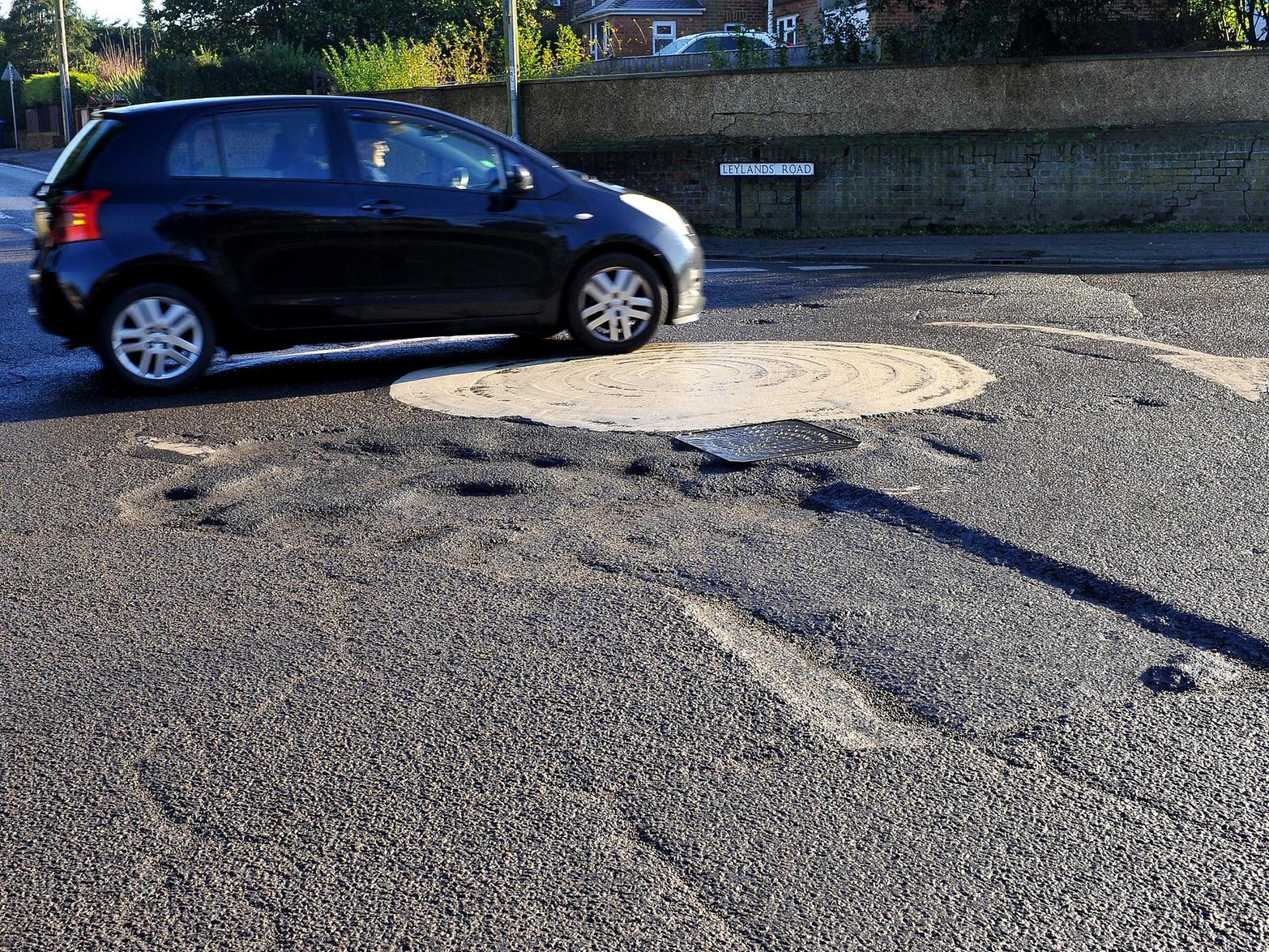 Pot holes on junction of London Road and Leylands Road, Burgess Hill