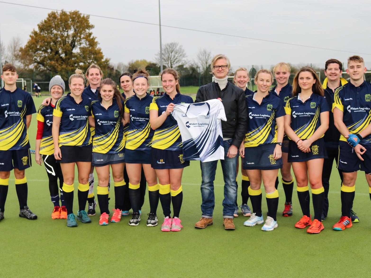 REWHC Mens and Ladies first team players with Russell Green, Managing Director of sponsors Widem Logistics