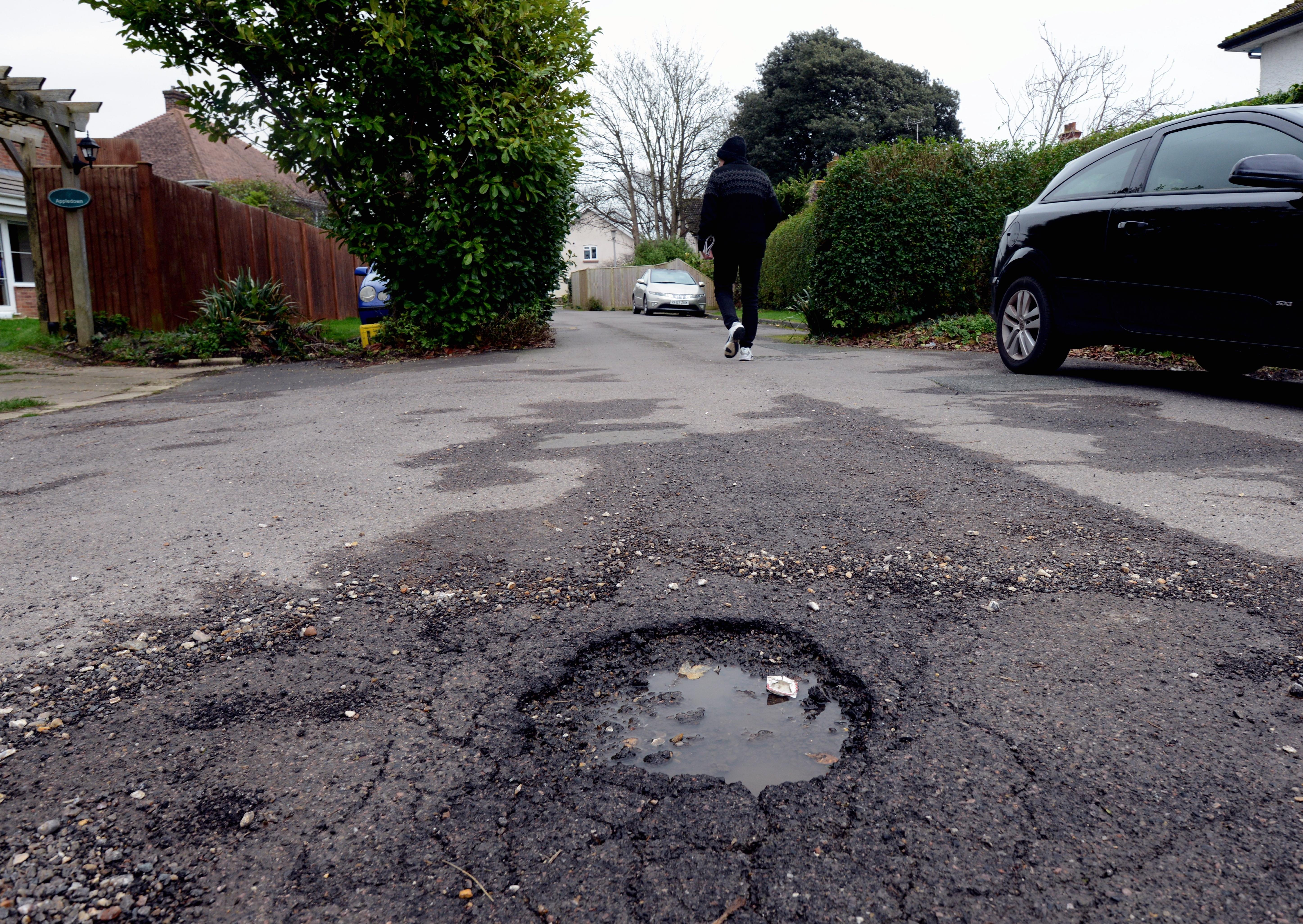 ks20010-2 Bognor Potholes  phot kate Pothole at the Avenue and Nyewood Gardens in Bognor.ks20010-2 SUS-201201-212214008