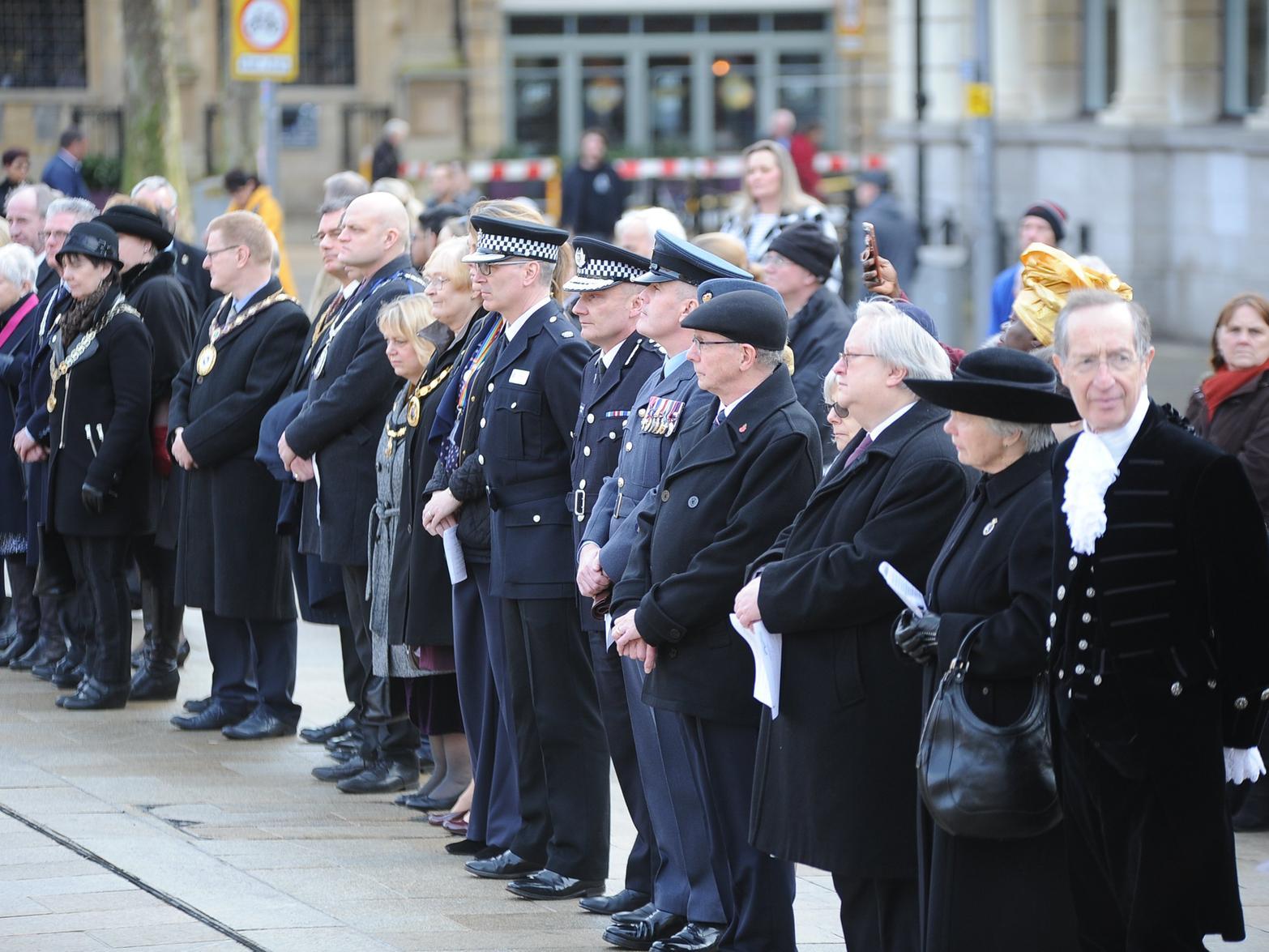 The congregation takes a moment to reflect