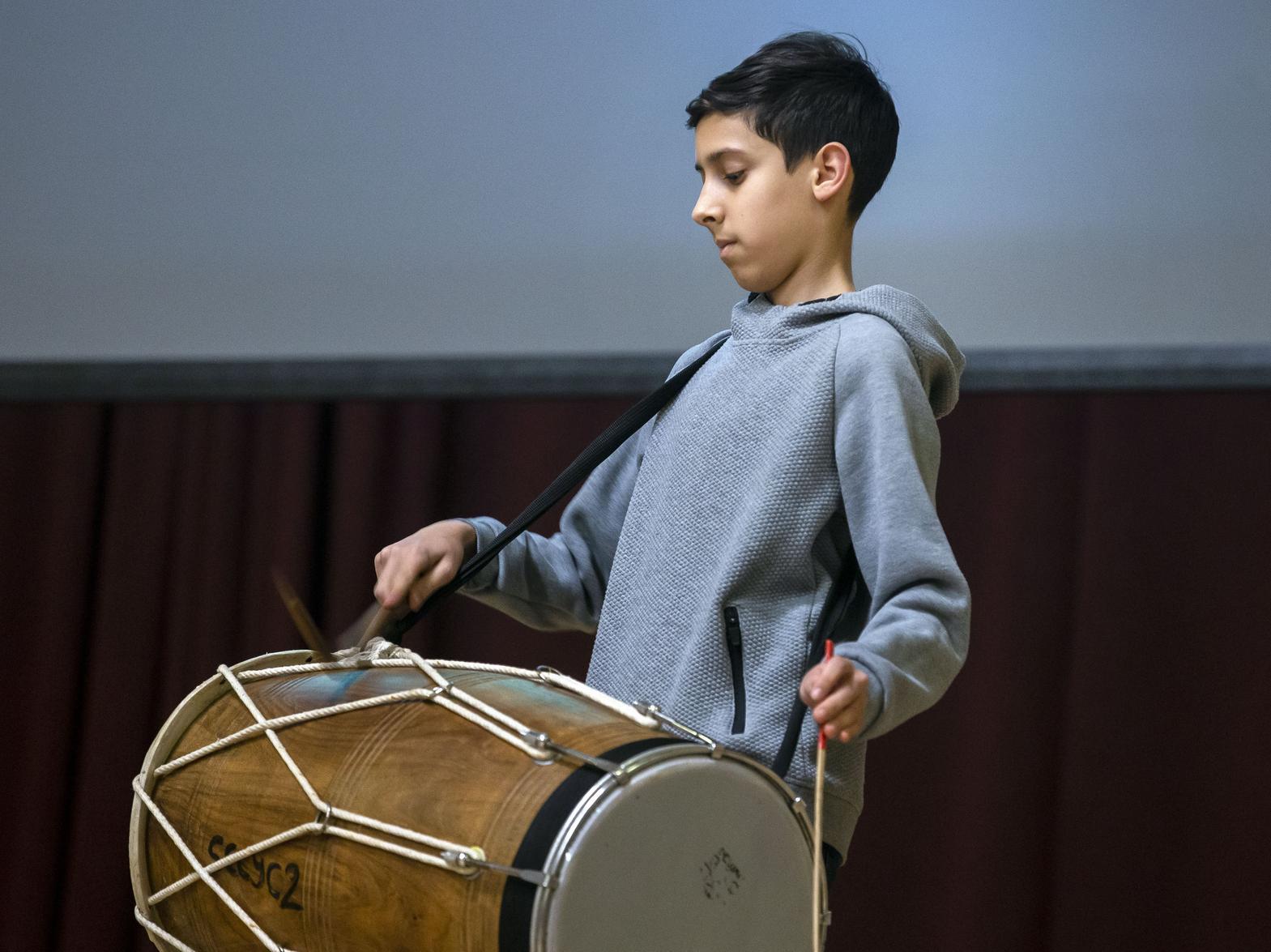 A drummer from Northampton Punjabi School perform at the Holocaust Memorial Day service