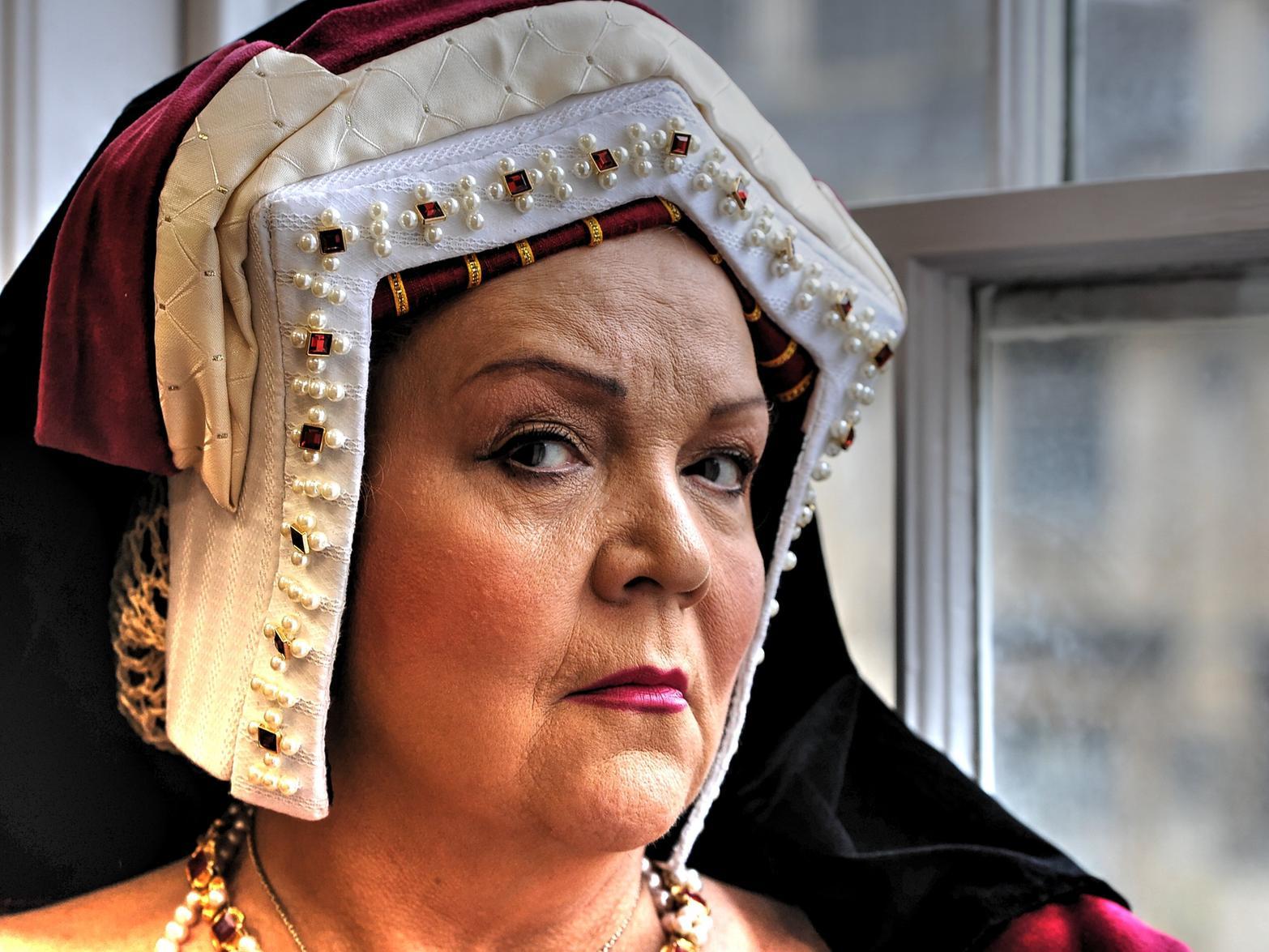 An actor plays Katharine of Aragon