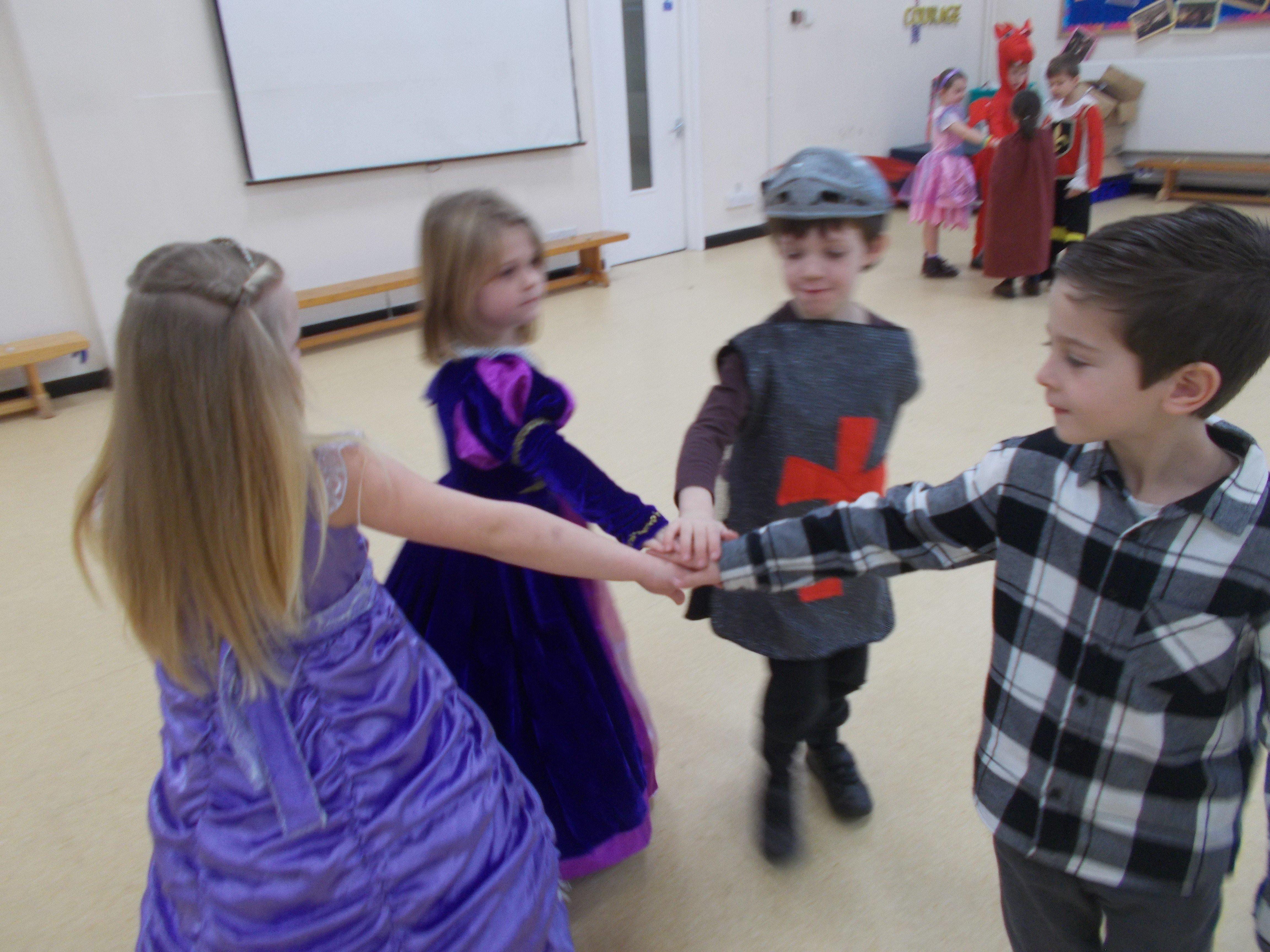 Children at Upper Beeding Primary School dancing during the medieval party SUS-200129-145503001