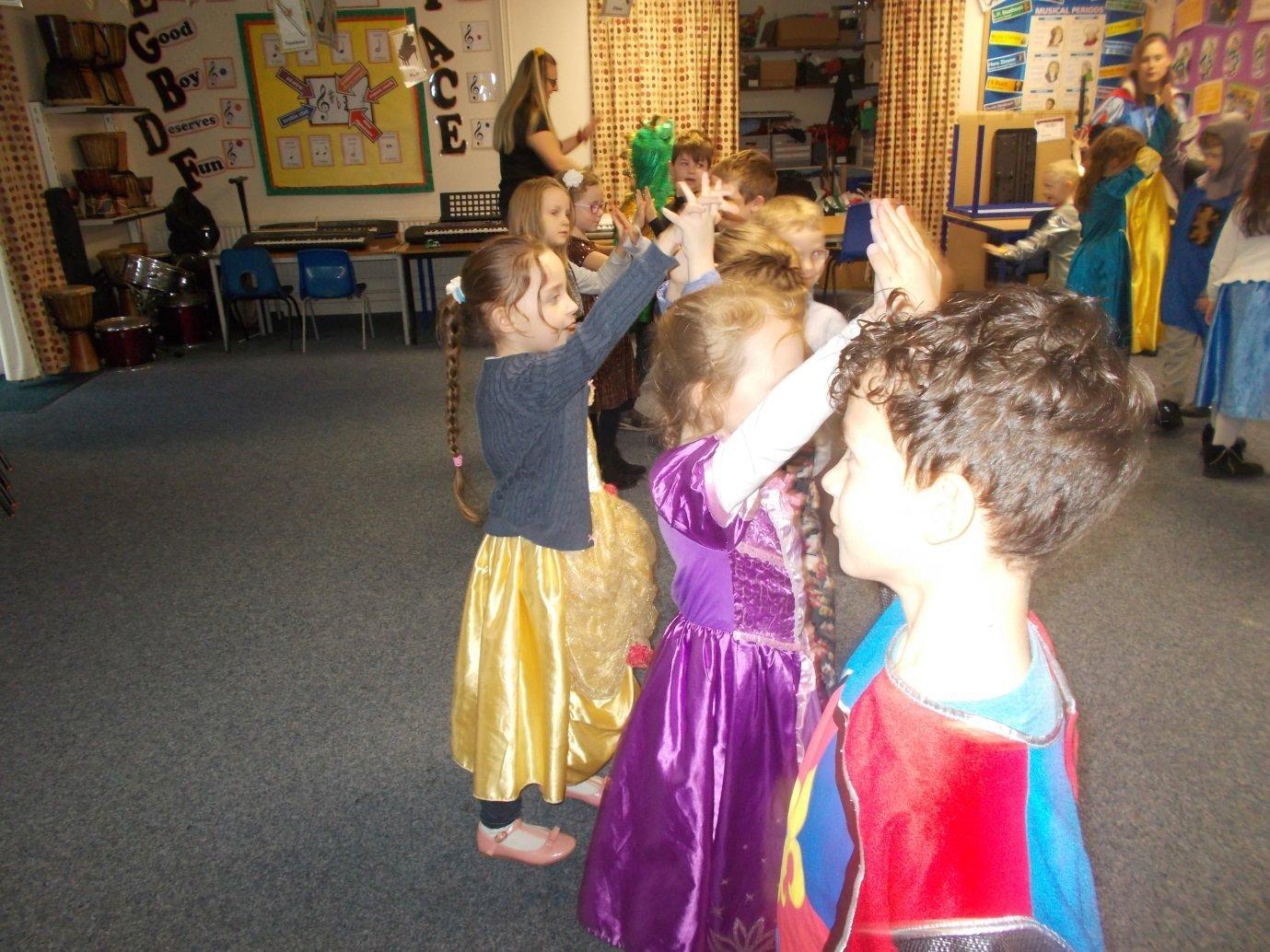 Children at Upper Beeding Primary School dancing during the medieval party SUS-200129-145514001