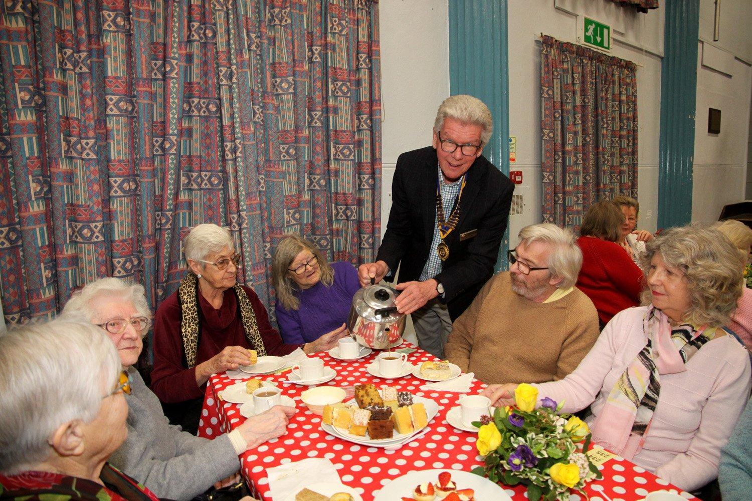 Rotary President Peter Primett pours the tea at Uckfield Rotary Seniors' Party