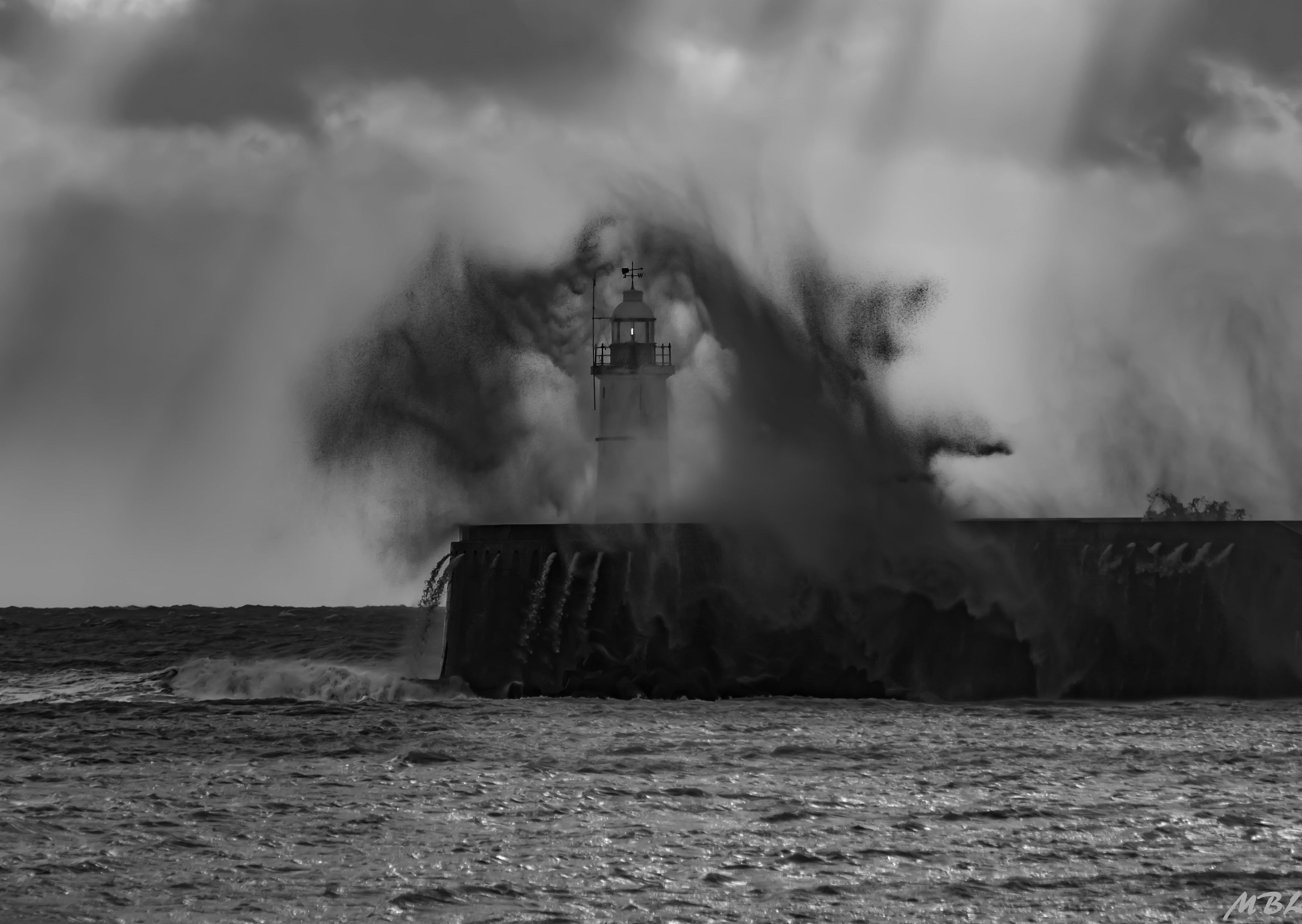 Newhaven Harbour arm in stormy weather by Marcus Berrisford. "Conditions were a bit challenging when I took this one. Driving rain, sea spray, a gale so strong I could hardly stand up and, despite all that, sunlight so bright it threatened to over expose the picture. Good fun though!" he said. SUS-200130-093652001