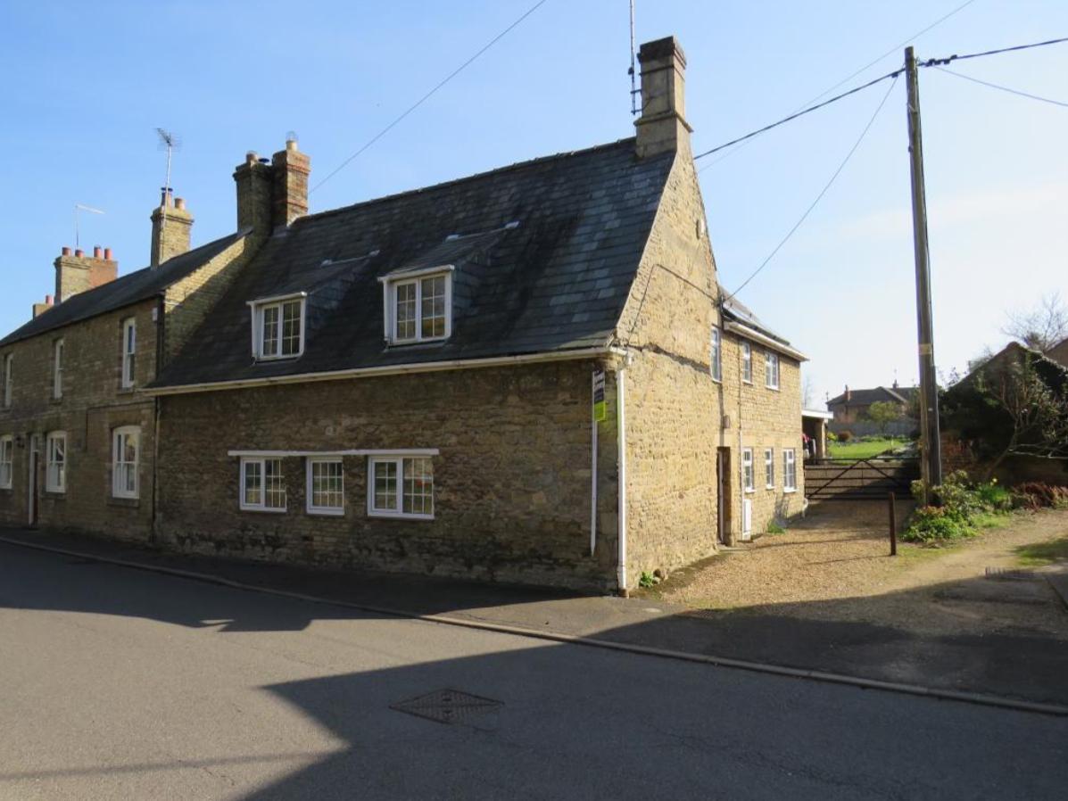 This former pub in the beautiful village of Warmington, East Northants, has retained its charm. Angel Cottage has an inglenook fireplace, Rayburn stove and plenty of scope for redevelopment. Its priced at 539,000.