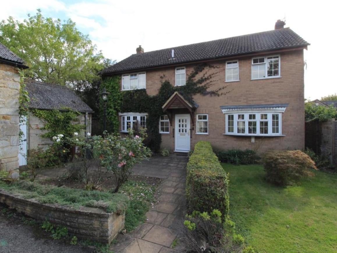 This family home is in need of complete refurbishment. Its on a big plot in the centre of gorgeous Gretton and has two outbuildings and a garage. Its priced at 530,000.
