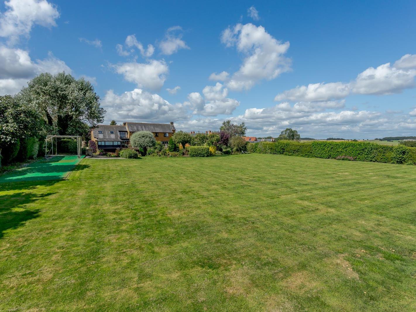 There is plenty of land to go with this stunning home. Photo: Fine and Country.