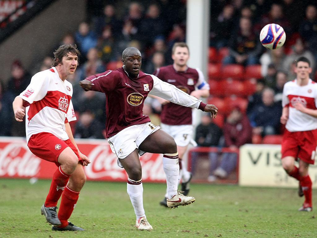 Adebayo Akinfenwa in action for the Cobblers in their 2-0 win at Walsall in March, 2008 (Pictures: Pete Norton)