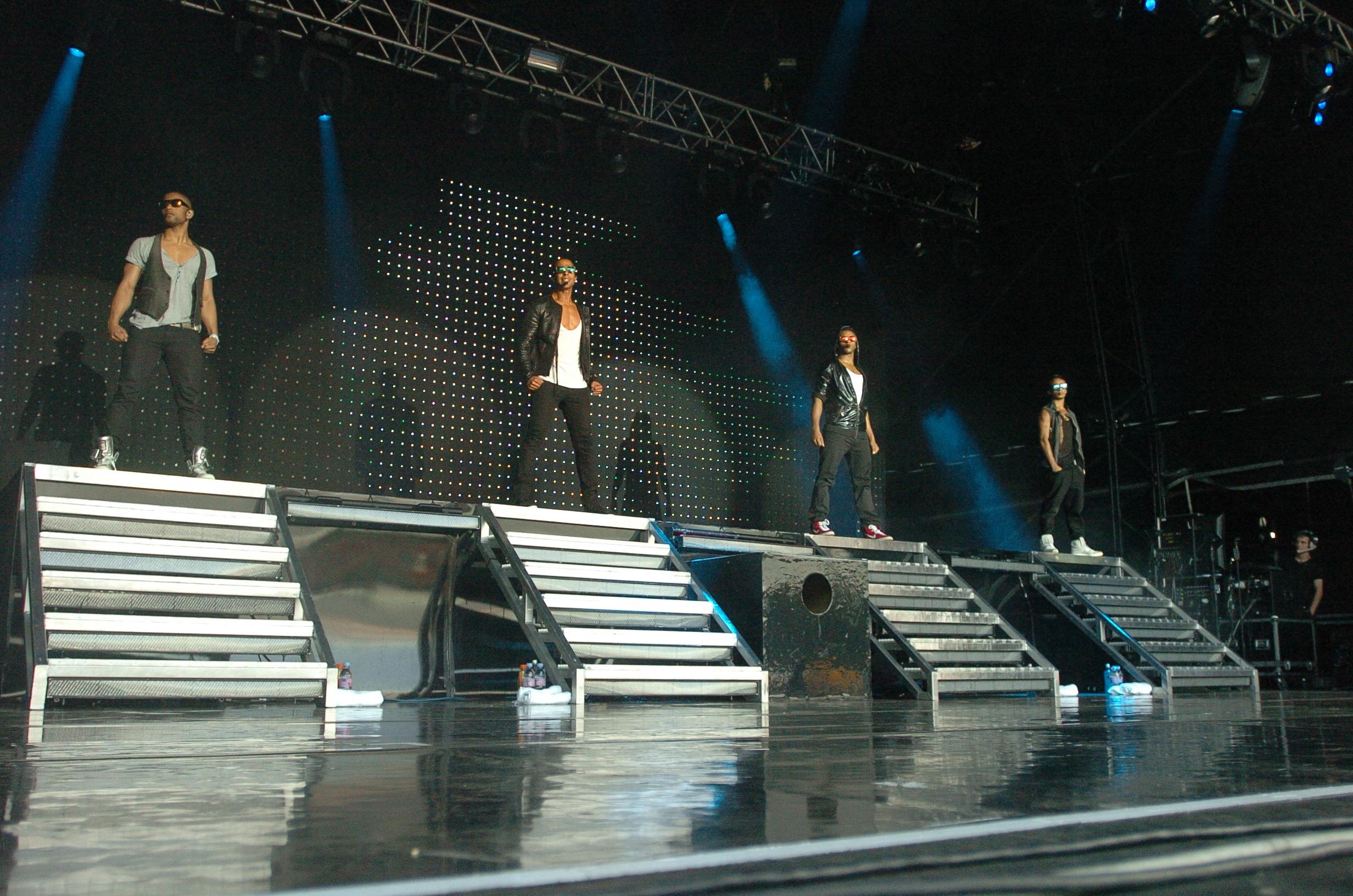 JLS with Aston Merrygold are pictured preforming on the embankment in Peterborough
