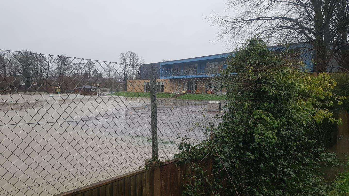 The playground of Arunside Primary School in Blackbridge Lane, Horsham, was submerged SUS-200216-143525001