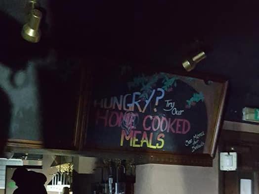 A sign still promotes their home-cooked meals.
Photo by Annie Skelton.