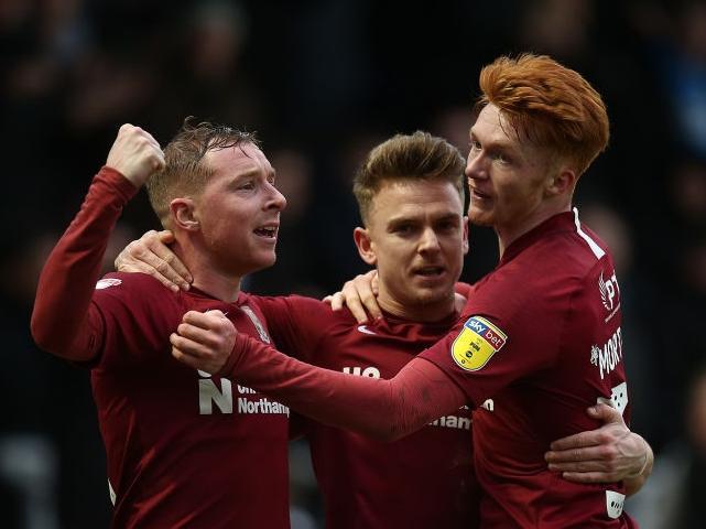 Nicky Adams, Callum Morton and Sam Hoskins are all smiles after Cobblers make it 2-0 against Exeter on Saturday. Pictures: Pete Norton