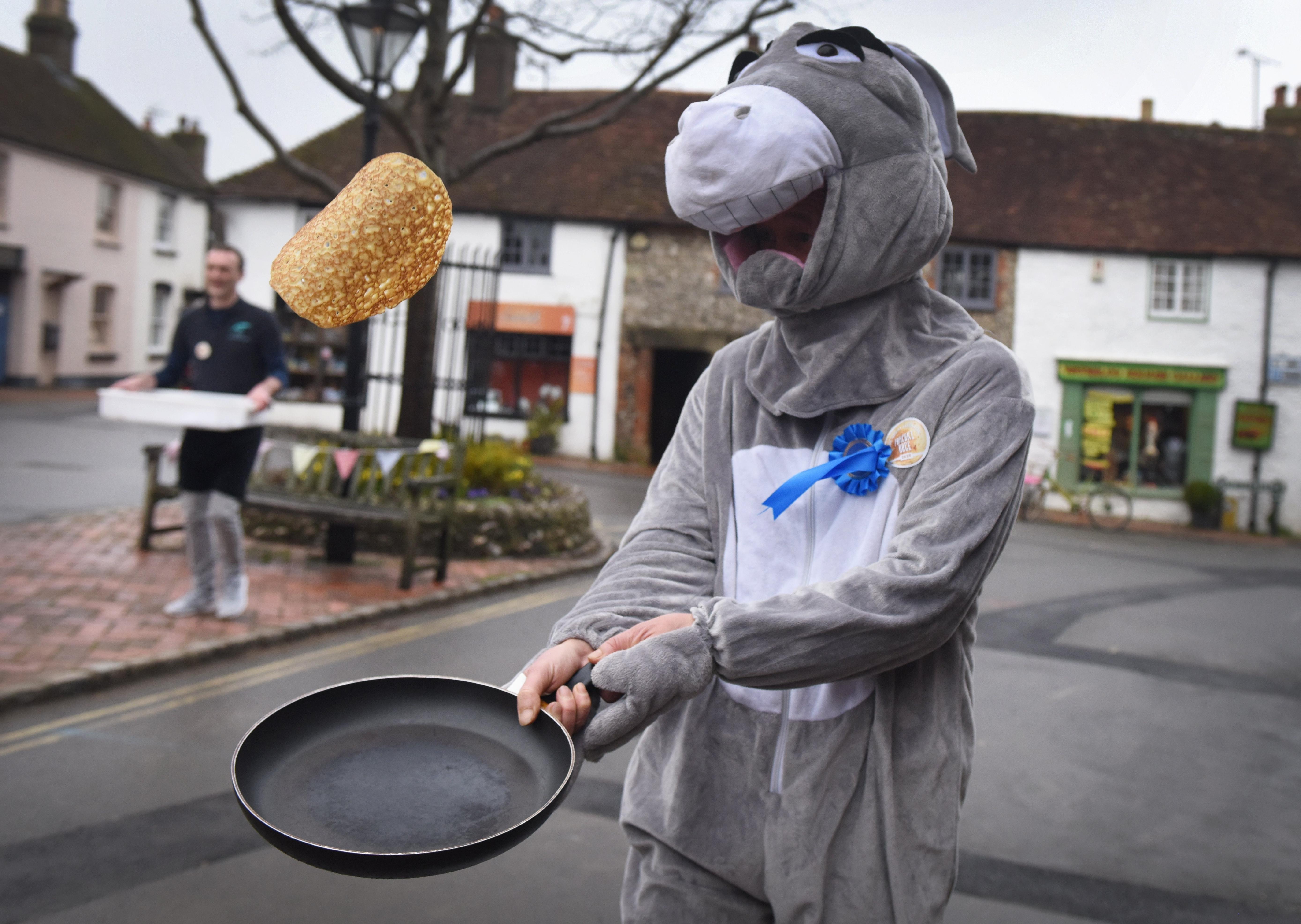 The first Great Alfriston Pancake Race. Photograph: Justin Lycett/ SUS-200223-142536001