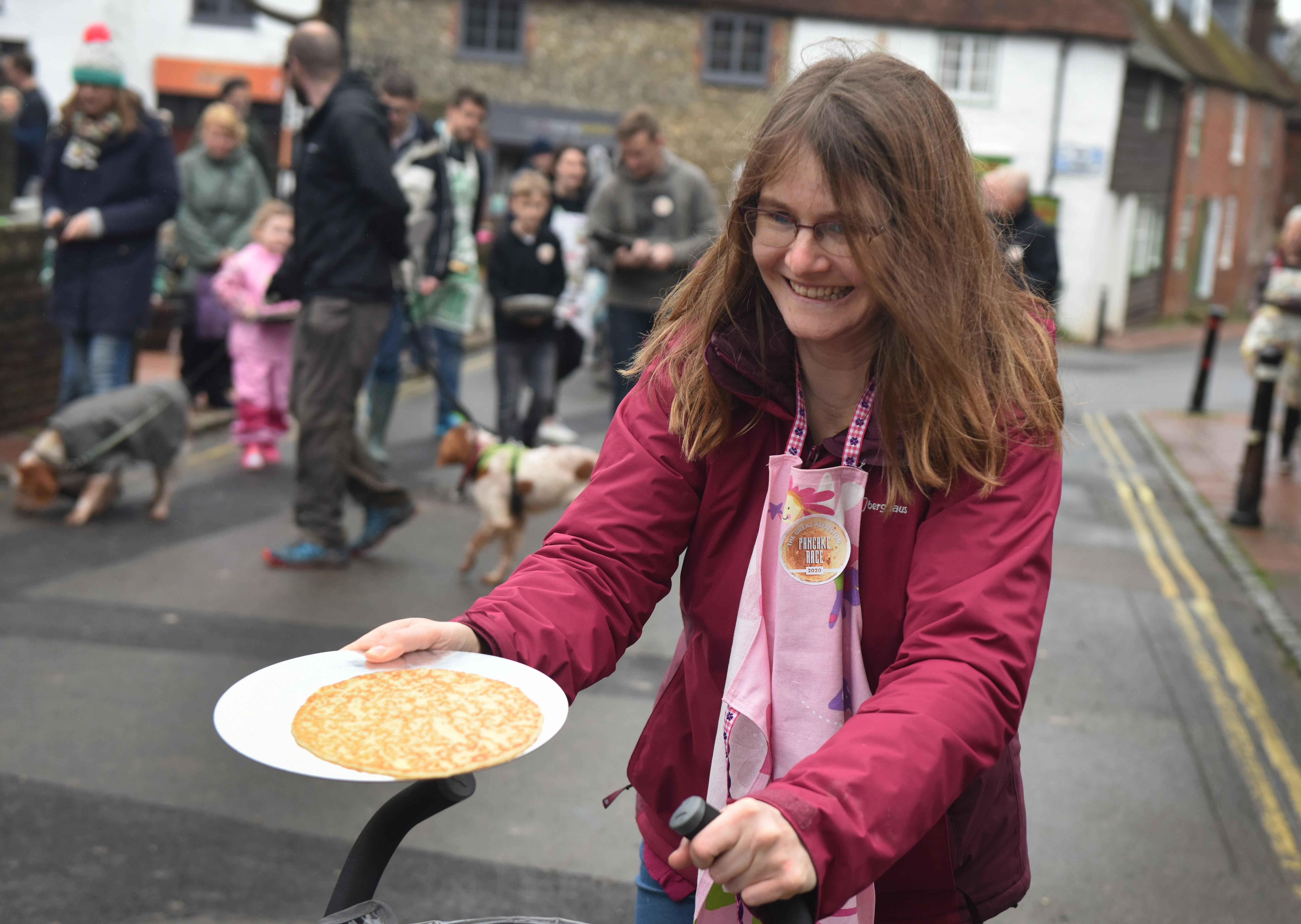 The first Great Alfriston Pancake Race. Photograph: Justin Lycett/ SUS-200223-142352001